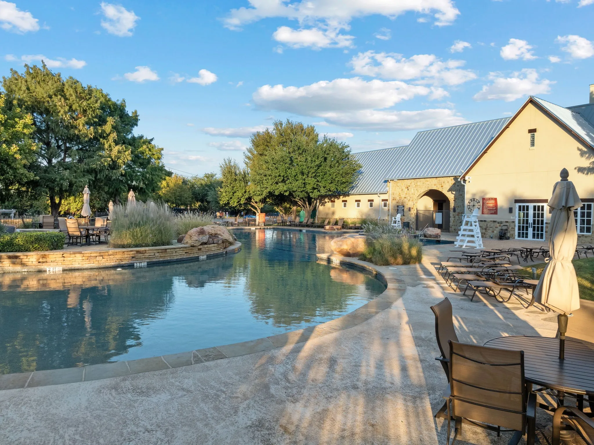 Beach entry and lap pool within this South Pool center