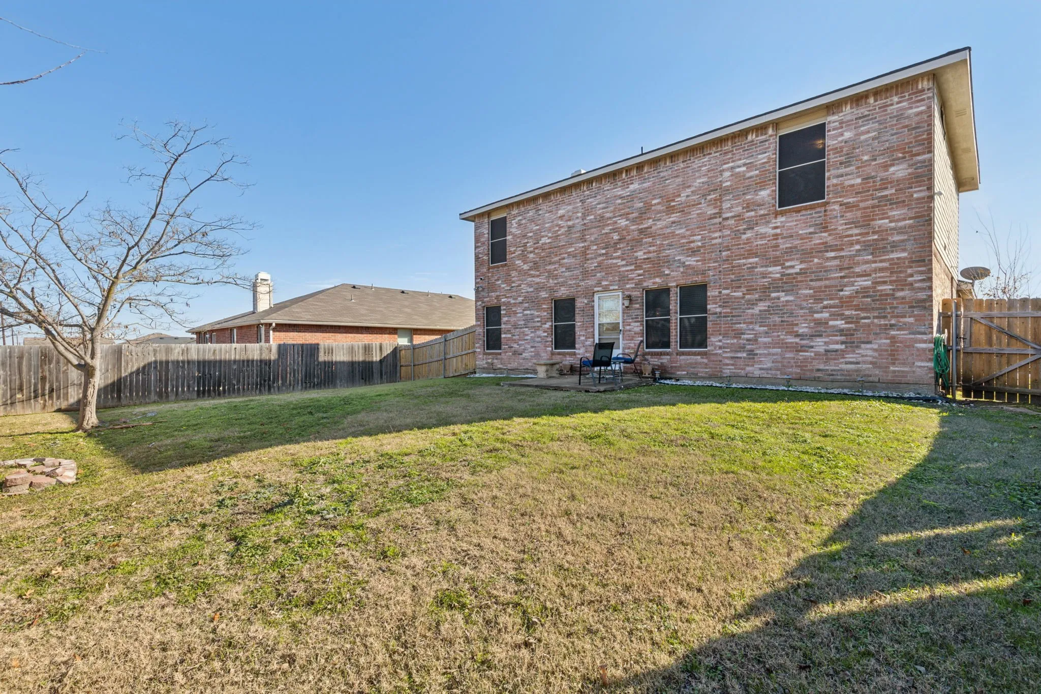 Huge backyard offers plenty of room for entertainment or play.
