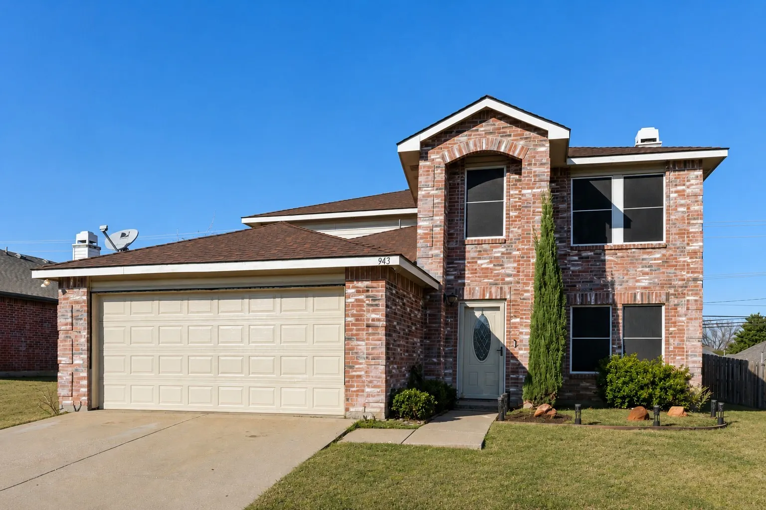 This home is almost 100% brick and equipped with solar screens for energy efficiency.