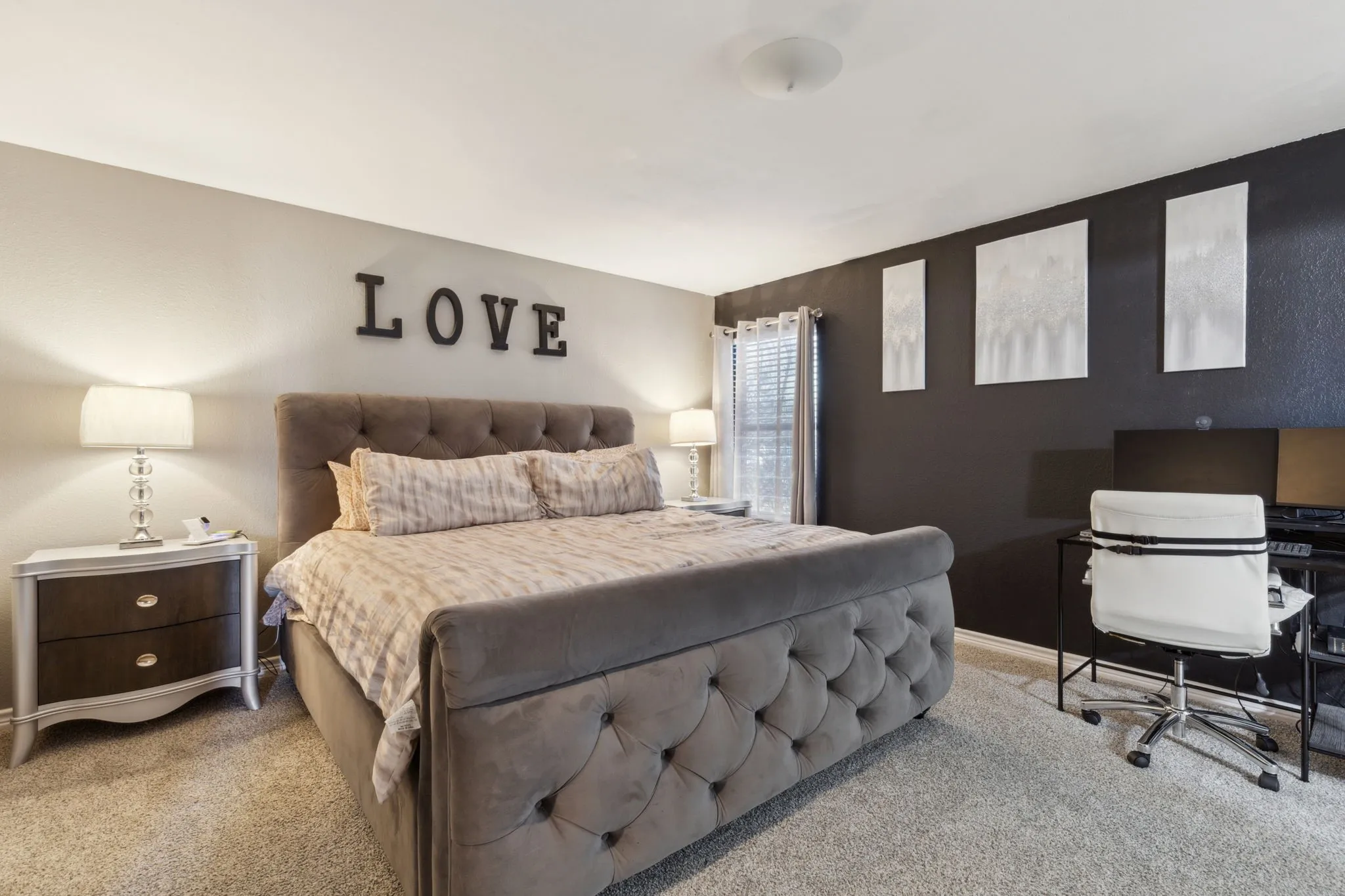 Primary bedroom is conveniently located on the first floor and features an ensuite bathroom.
