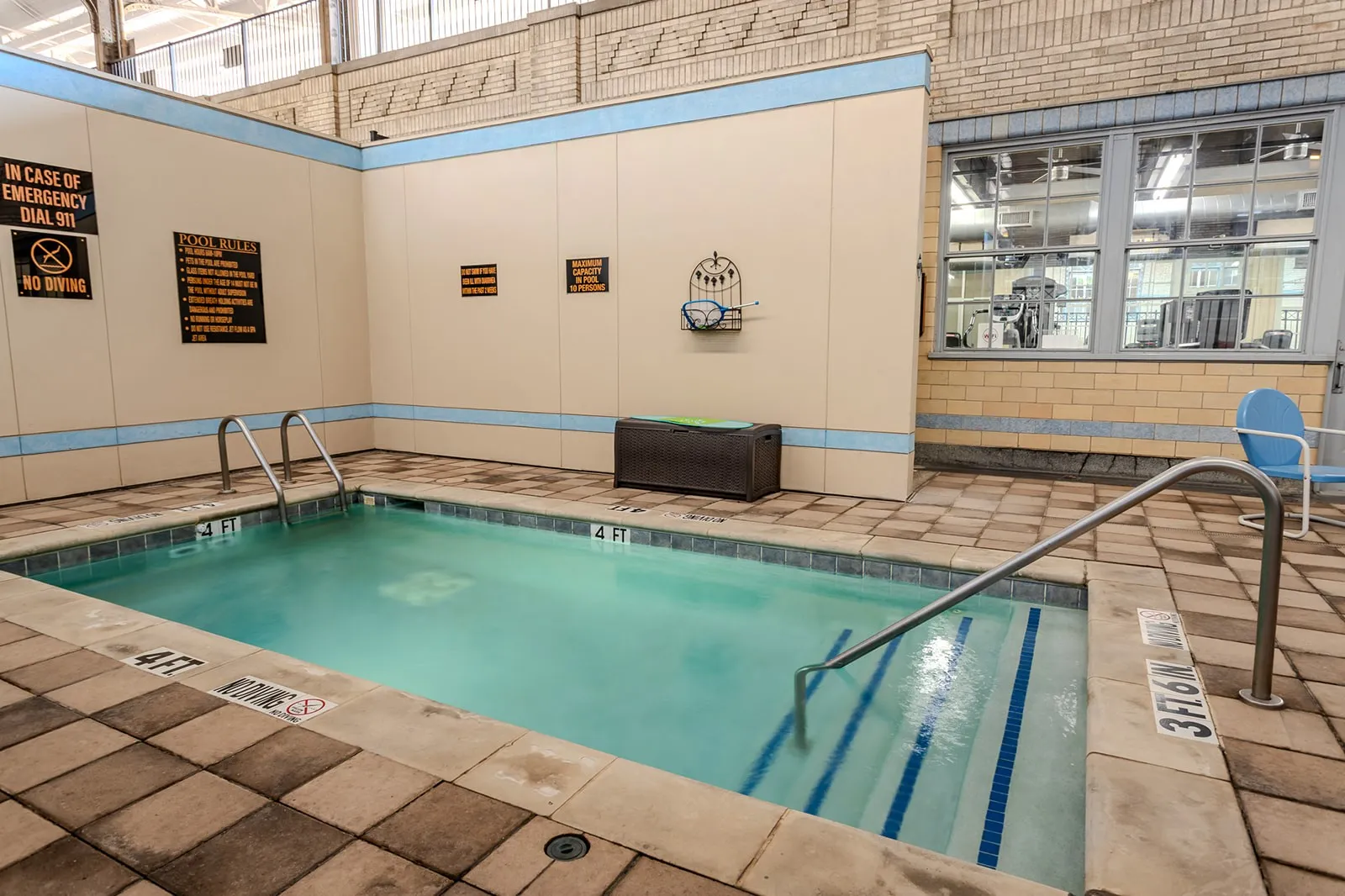 Indoor pool with tiled surround and integrated steps