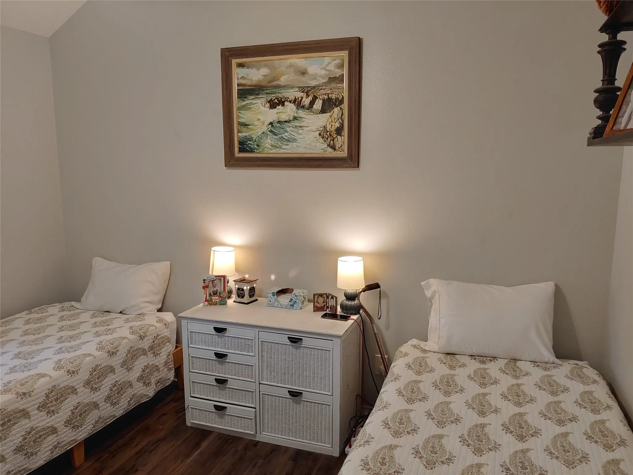 Neutral-toned walls complement wood-finish flooring