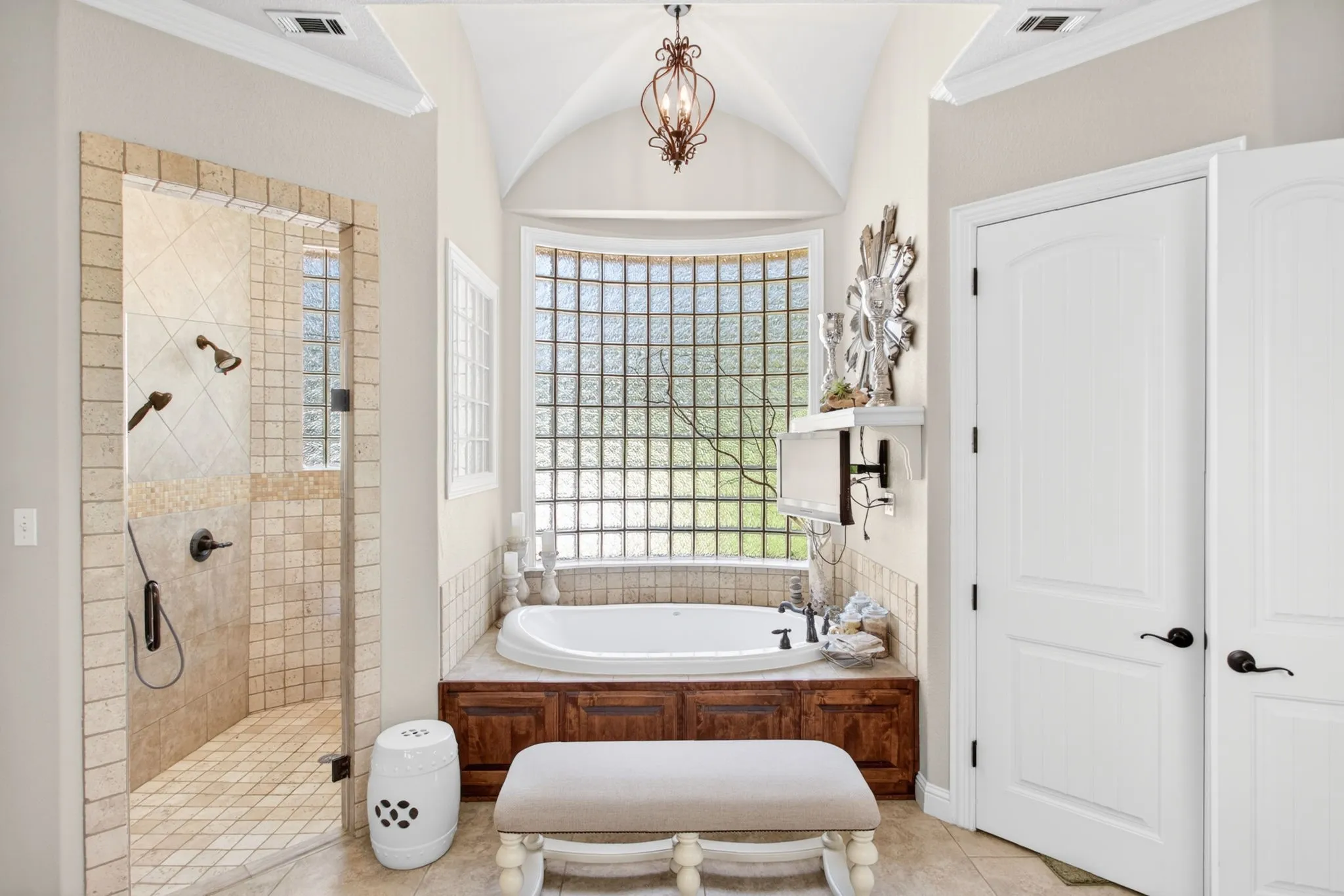 Deep soaking tub, and a large walk in shower compliment this primary bathroom.