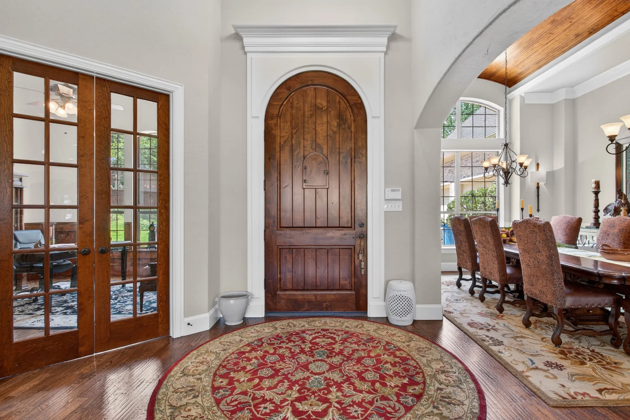 View of the front door from the living room.  The office is on the left and the dining room to the right.
