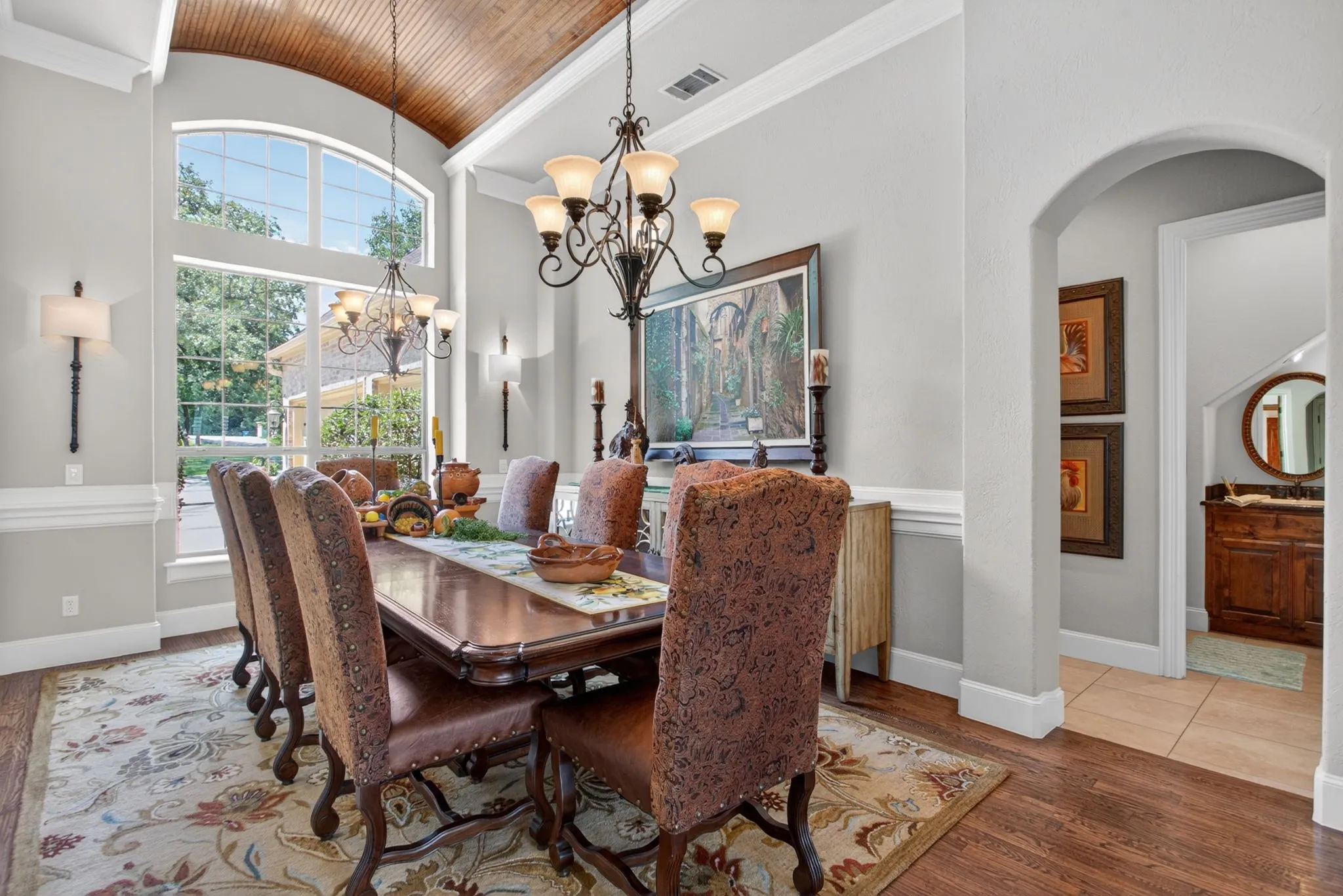 Dining room has a stunning barrel ceiling that adds height and character to the room.