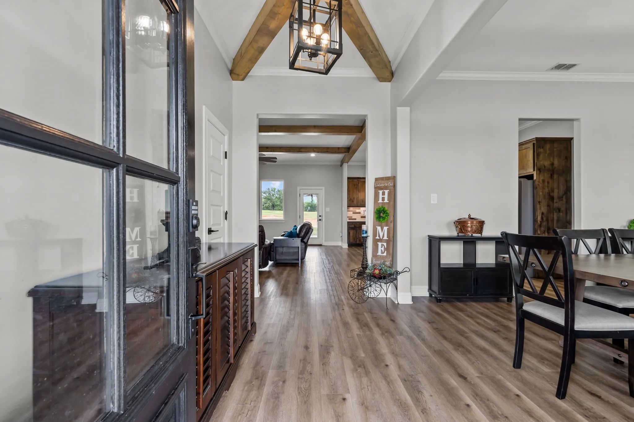 Entry with wood beam accents