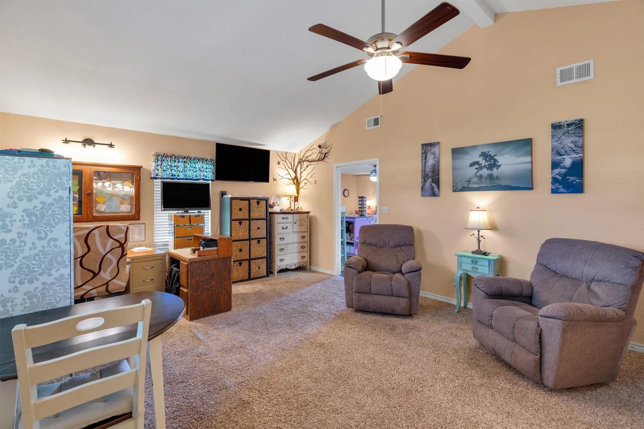 Vaulted ceiling with an integrated ceiling fan and light fixture