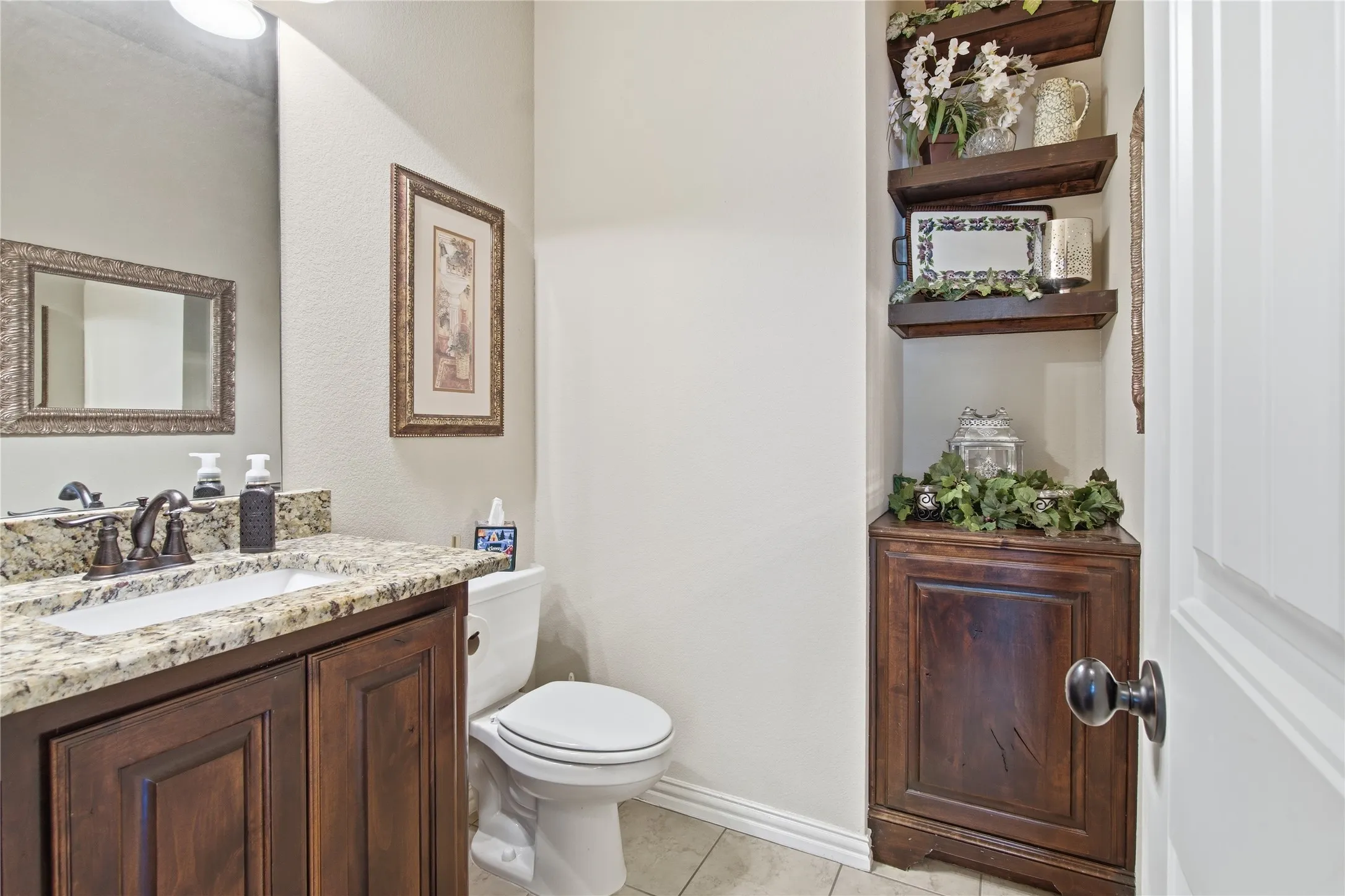 Roomy Half Bath at Entry