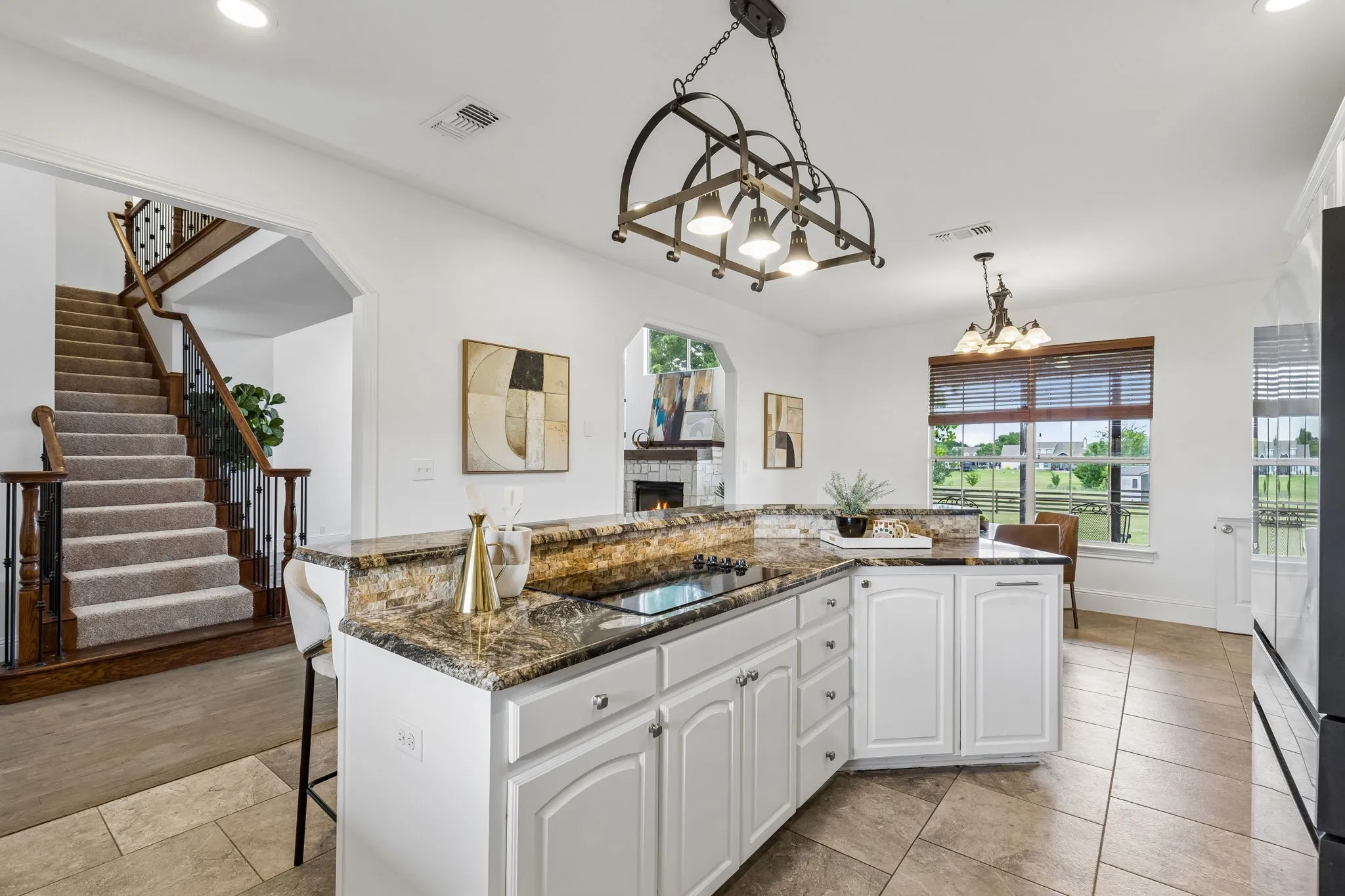 Freshly painted cabinets and exotic granite