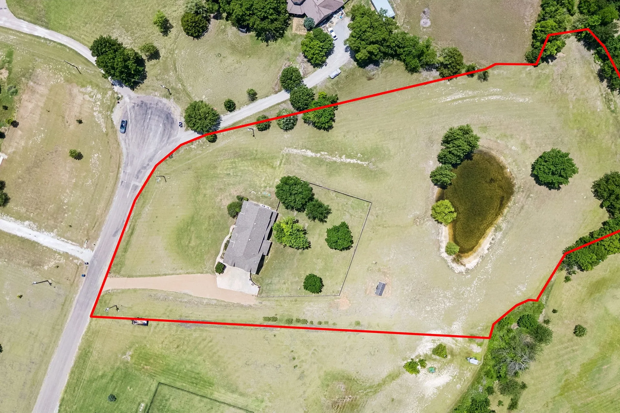 Acreage includes pond for fishing!