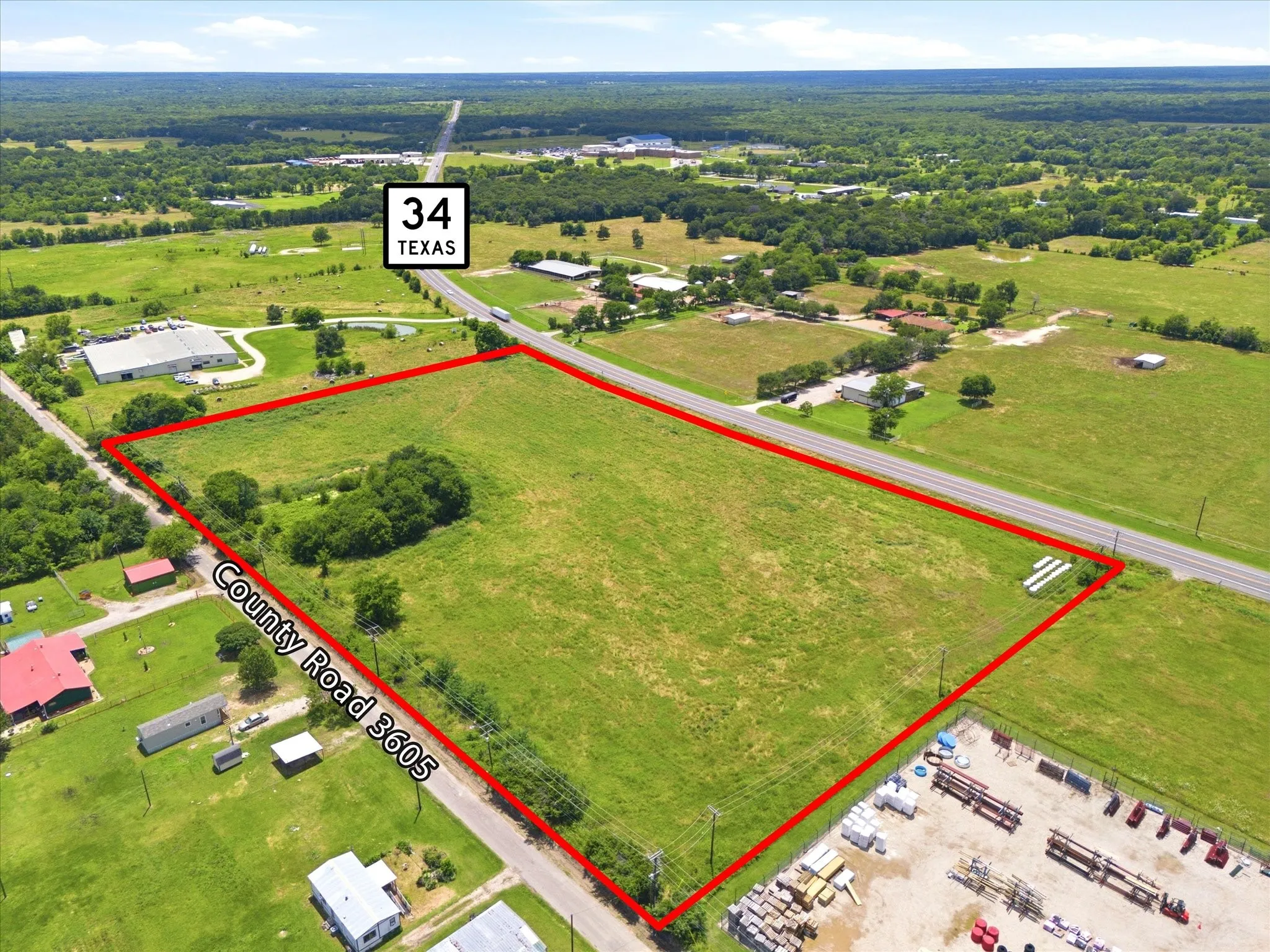 Red lines are estimated boundaries - refer to survey. View to south and west going toward Terrell.