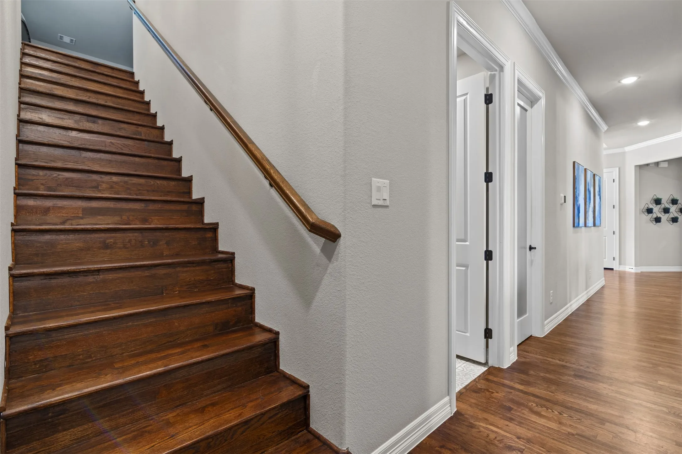 Stairs to game room and half bath
