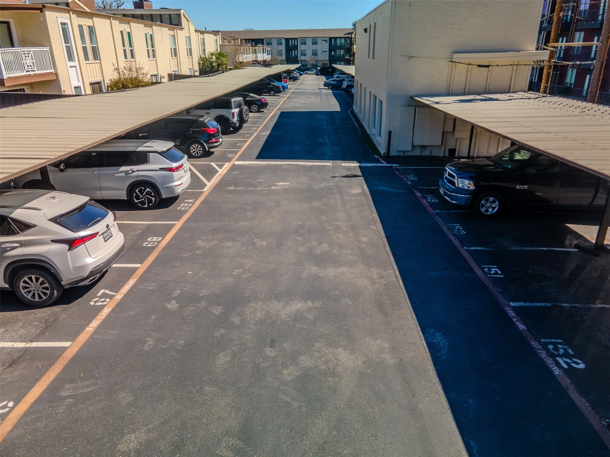 Reserved Parking Spot 68a is one on the left next to the walk way and so close to the condo.  The second reserved parking spot is 149 and adjacent the fitness center in the small building beside the covered parking on the right.  Seller says best parking possible.