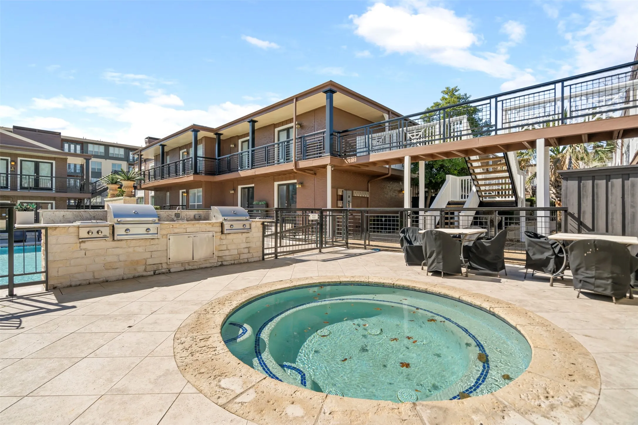 Spa area located away from the pool area feels more private and relaxed.