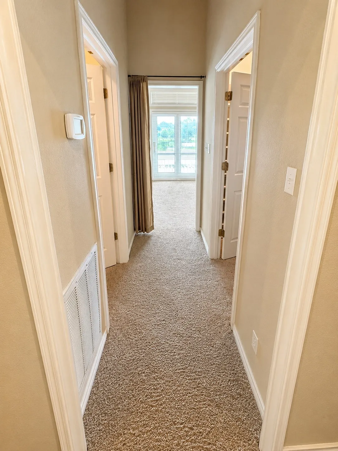 master hallway from bedroom to bathroom