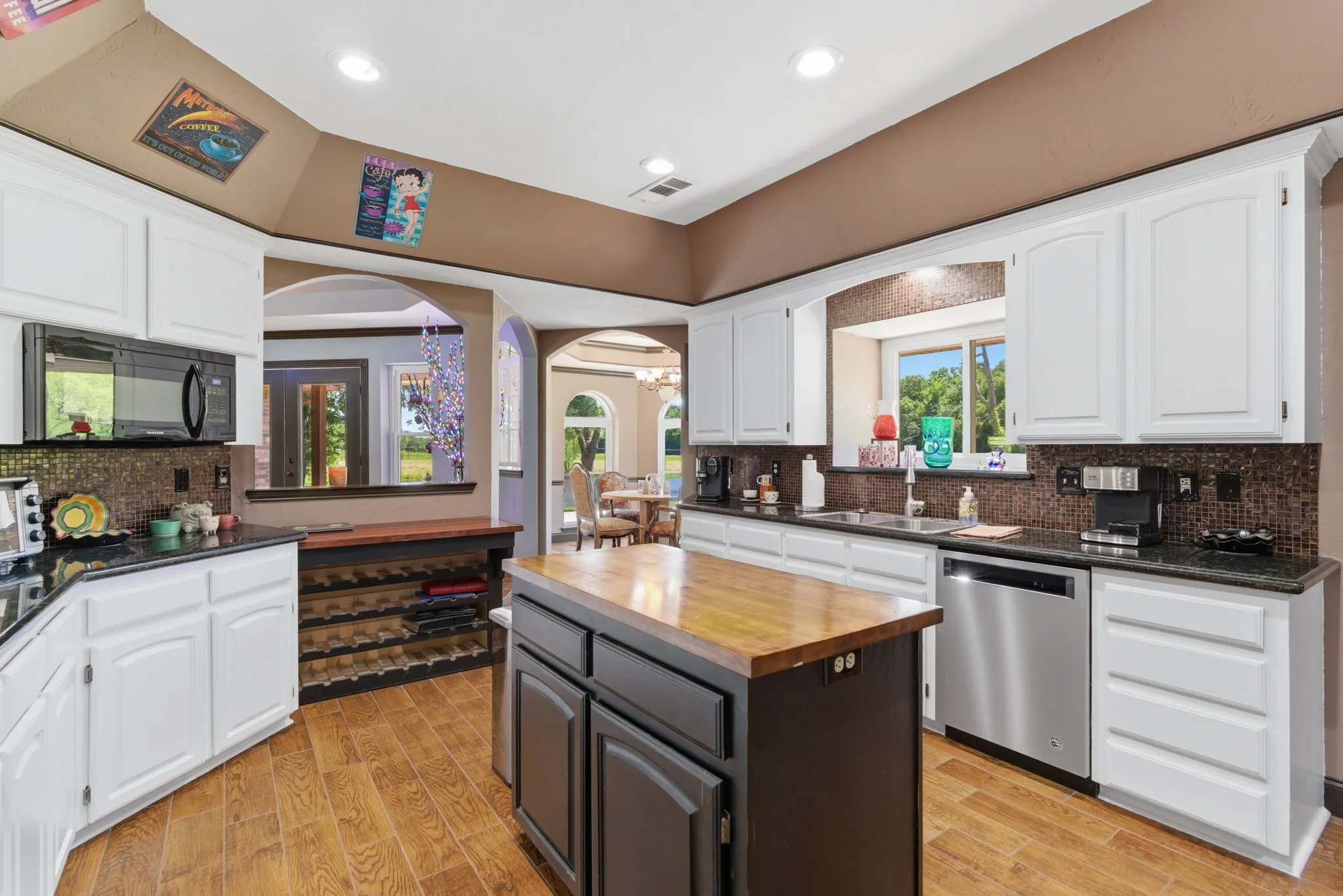 Kitchen prep space abounds and window overlooks the back yard.