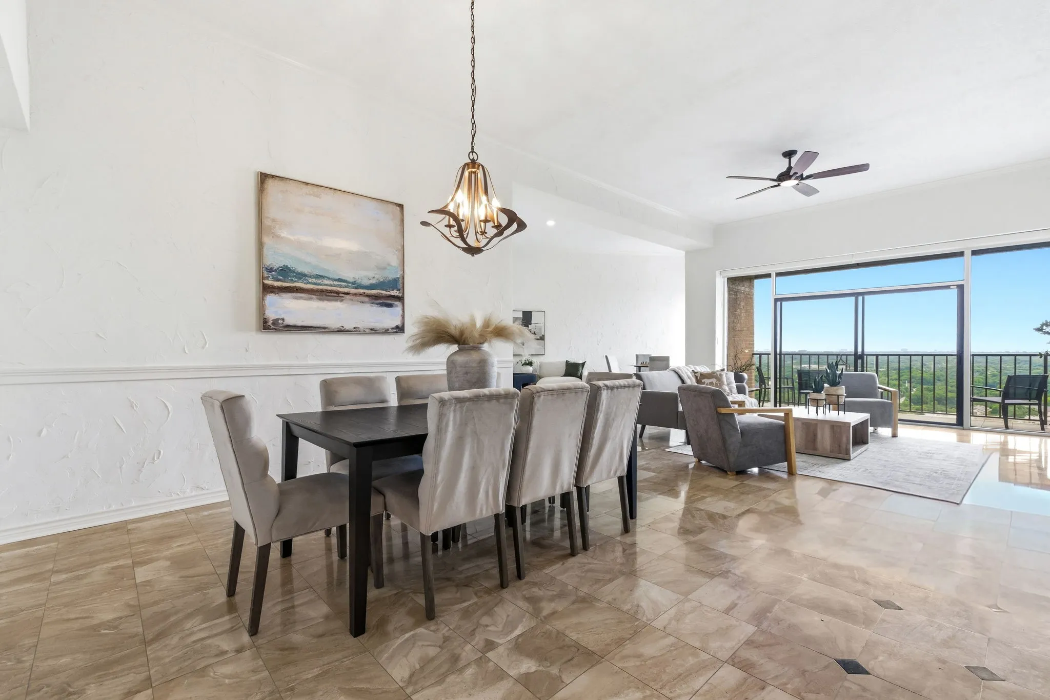 Open-concept living area with large-format tile flooring