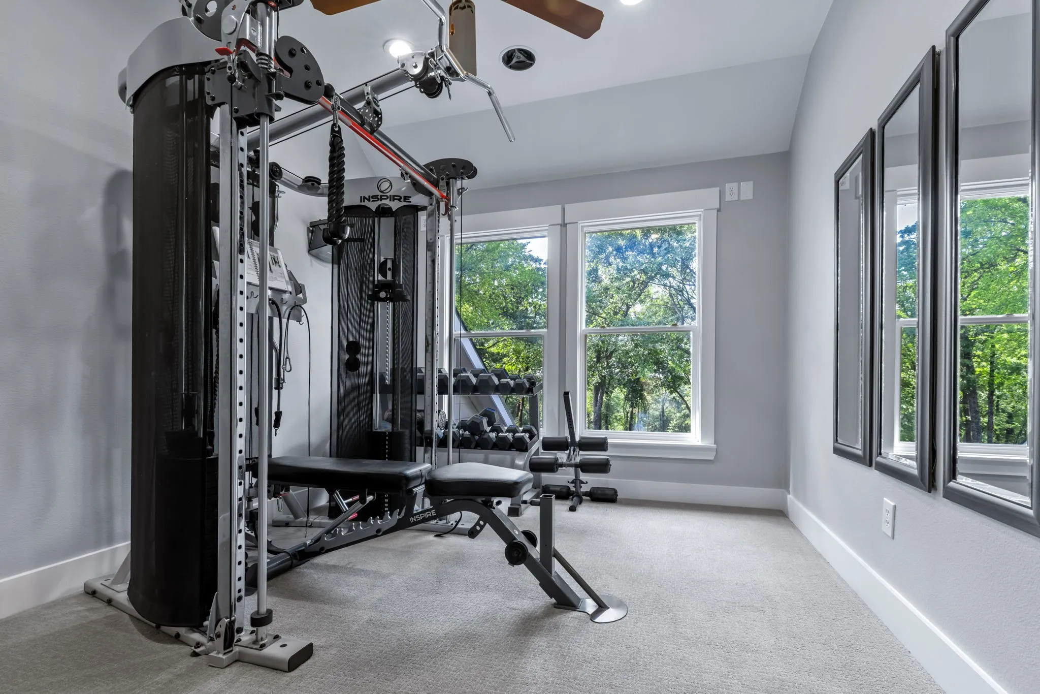 An upstairs loft/landing offers flexibility of use.  Currently serves as a work out area with VIEWS!