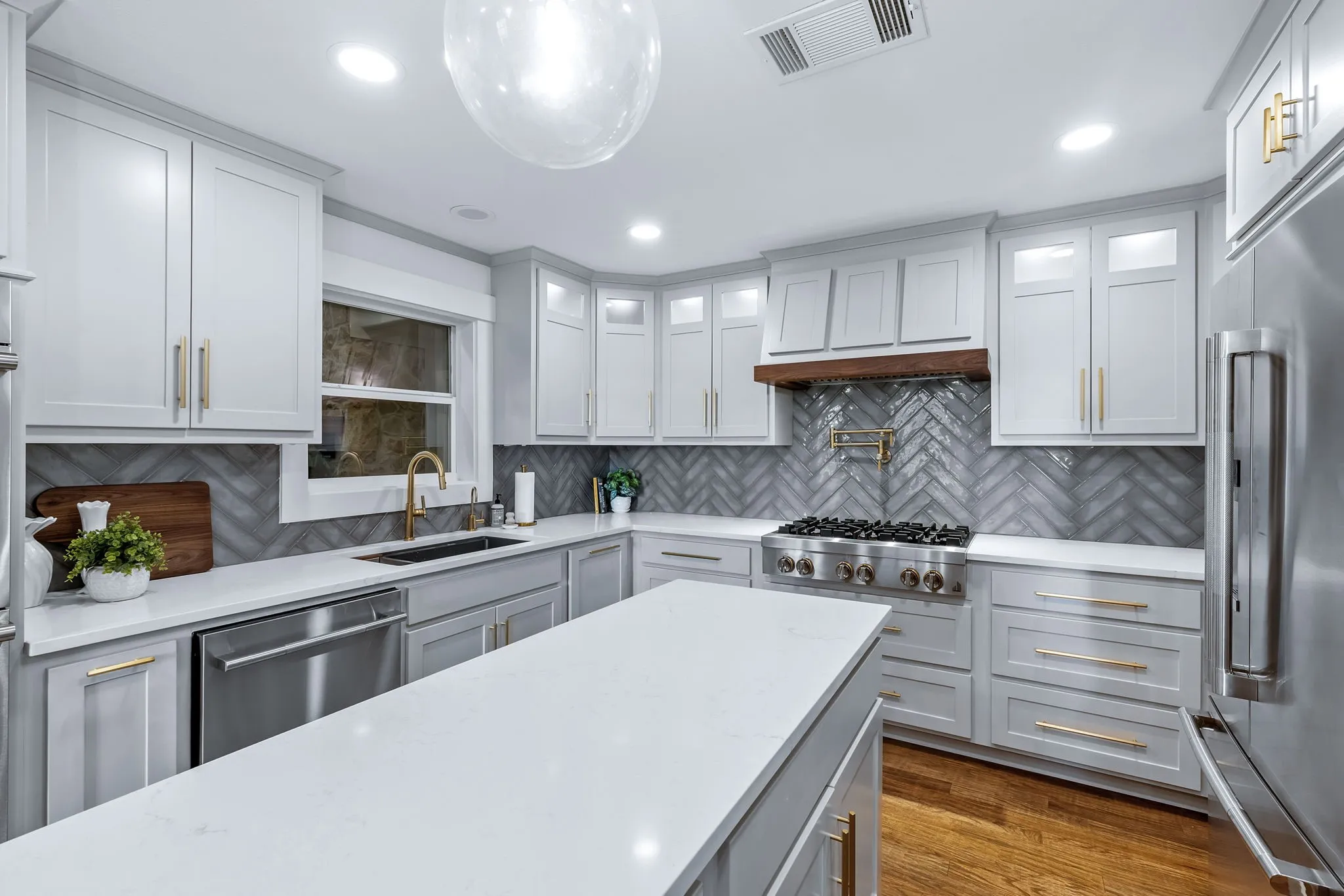 Chef's delight Kitchen with an abundance of cabinetry and counter space!  Note deep pull out drawers and so much more!