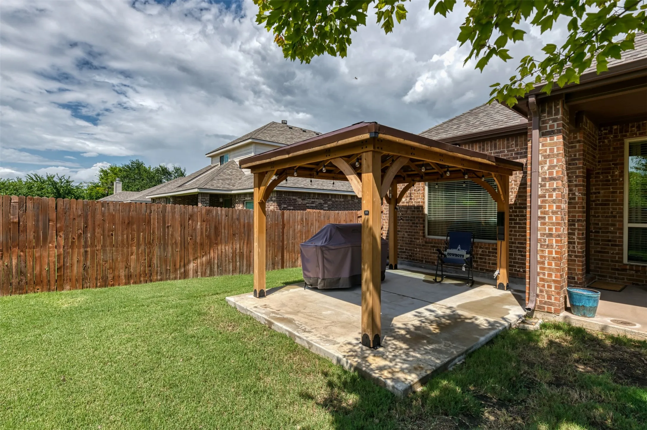 Covered gazebo area perfect from grilling or to add a hot tub for family fun and relaxation