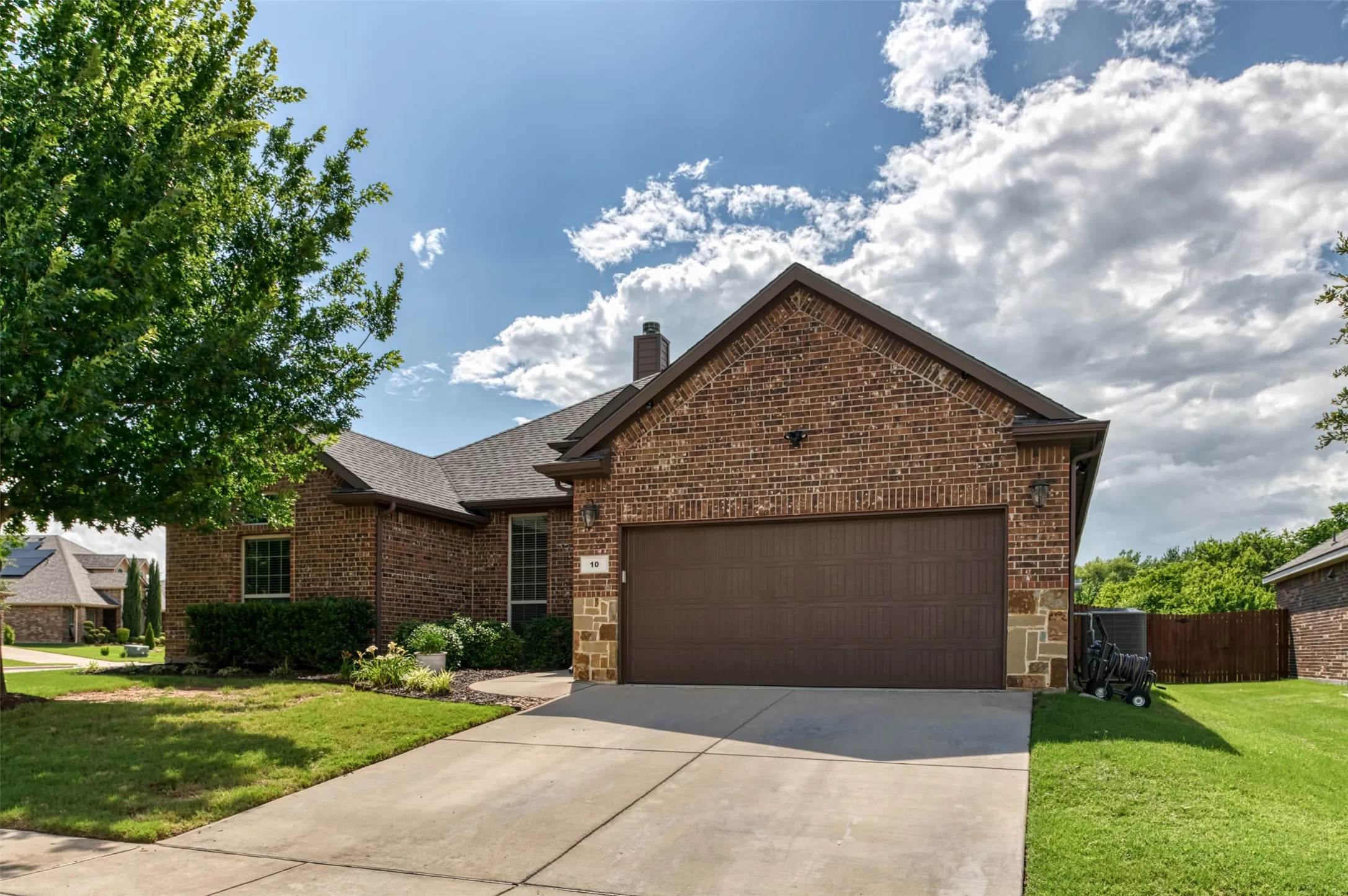 Front exterior view of side yard between homes