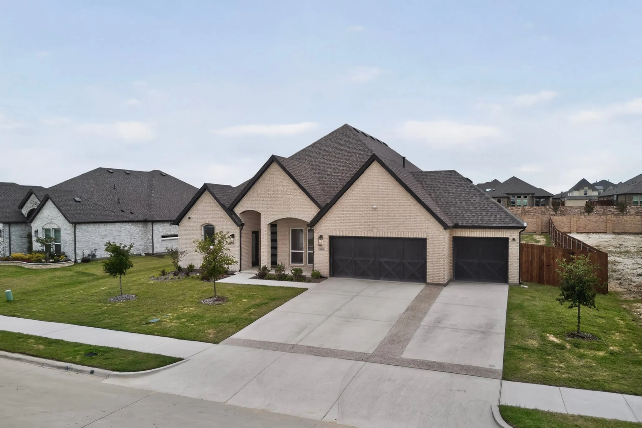 Contemporary brick exterior with dark trim accents