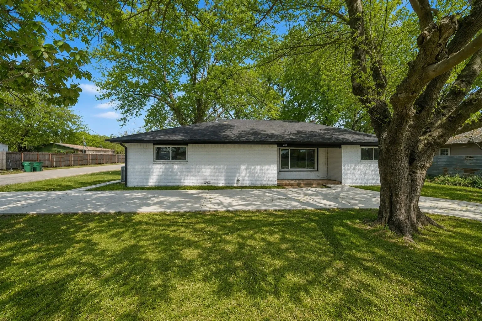 Circular driveway provides convenient access and additional off-street parking.