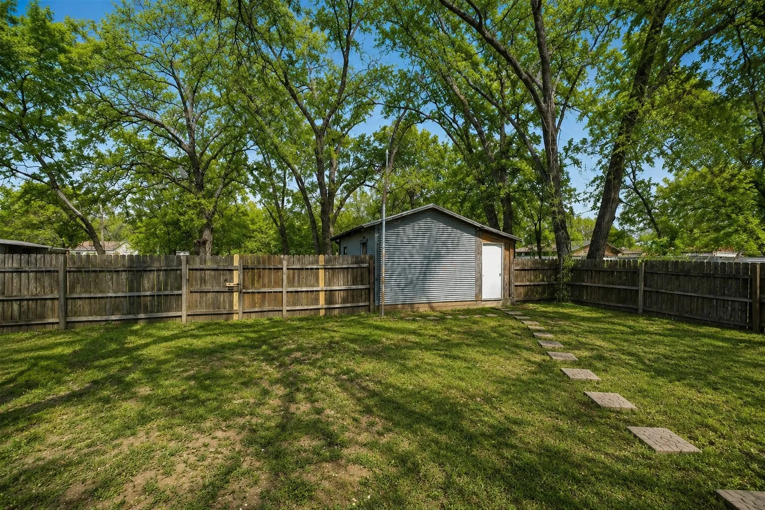 1. 600 N Mill in Bowie, TX offers mature trees, generous yard space and a convenient in-town location.