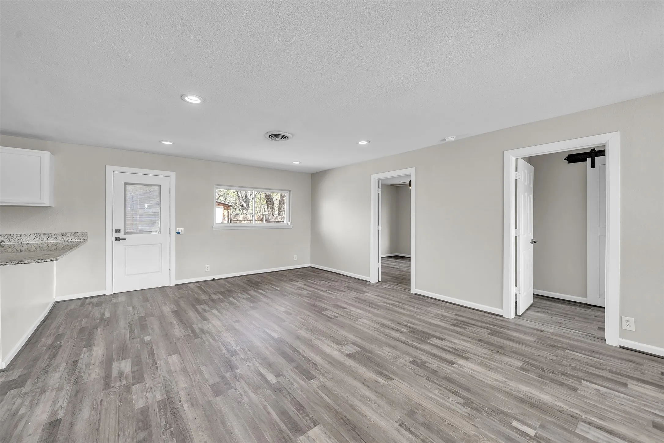 Spacious great room located directly off the kitchen at 600 N Mill.