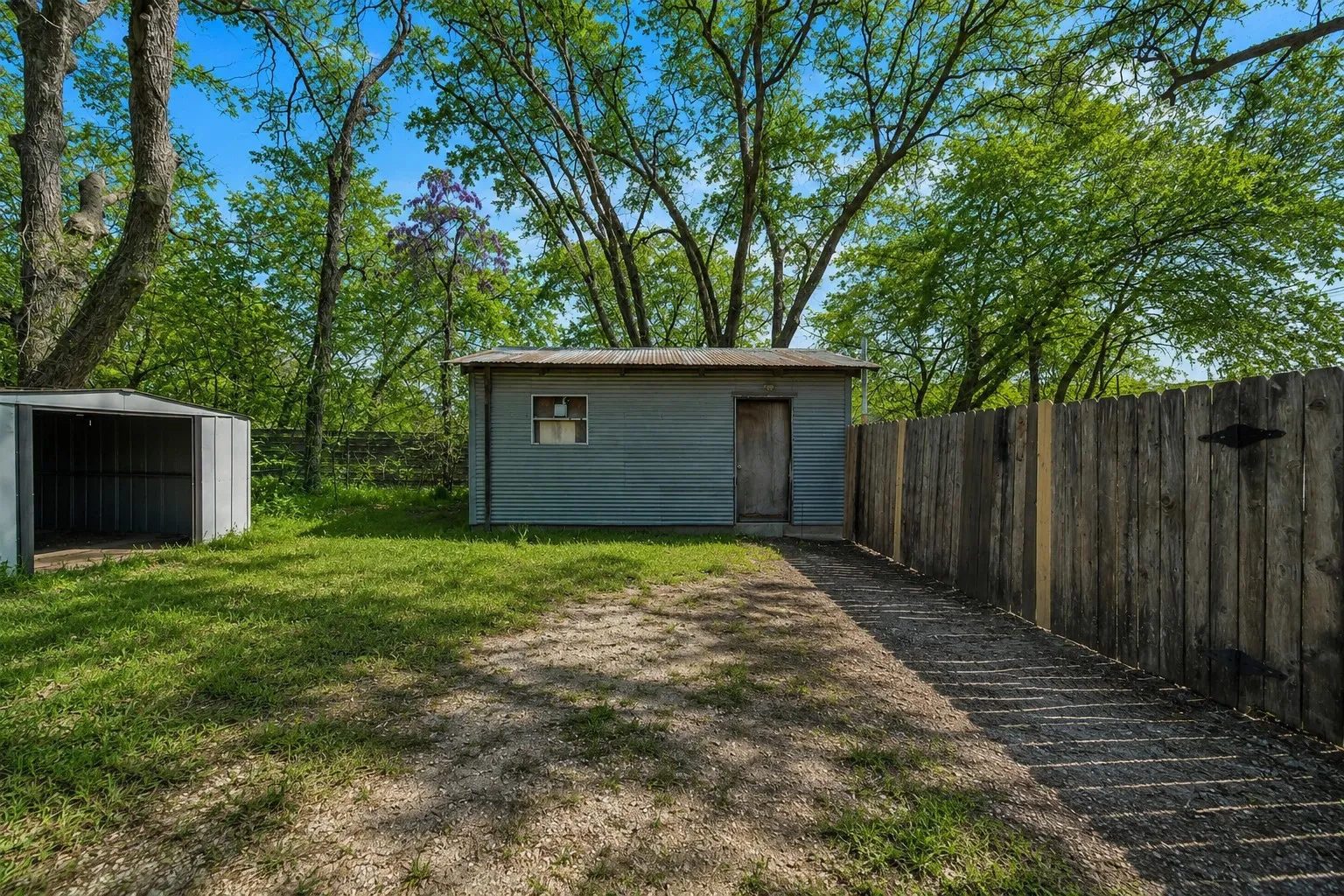 1. 600 N Mill in Bowie, TX offers mature trees, generous yard space and a convenient in-town location.
