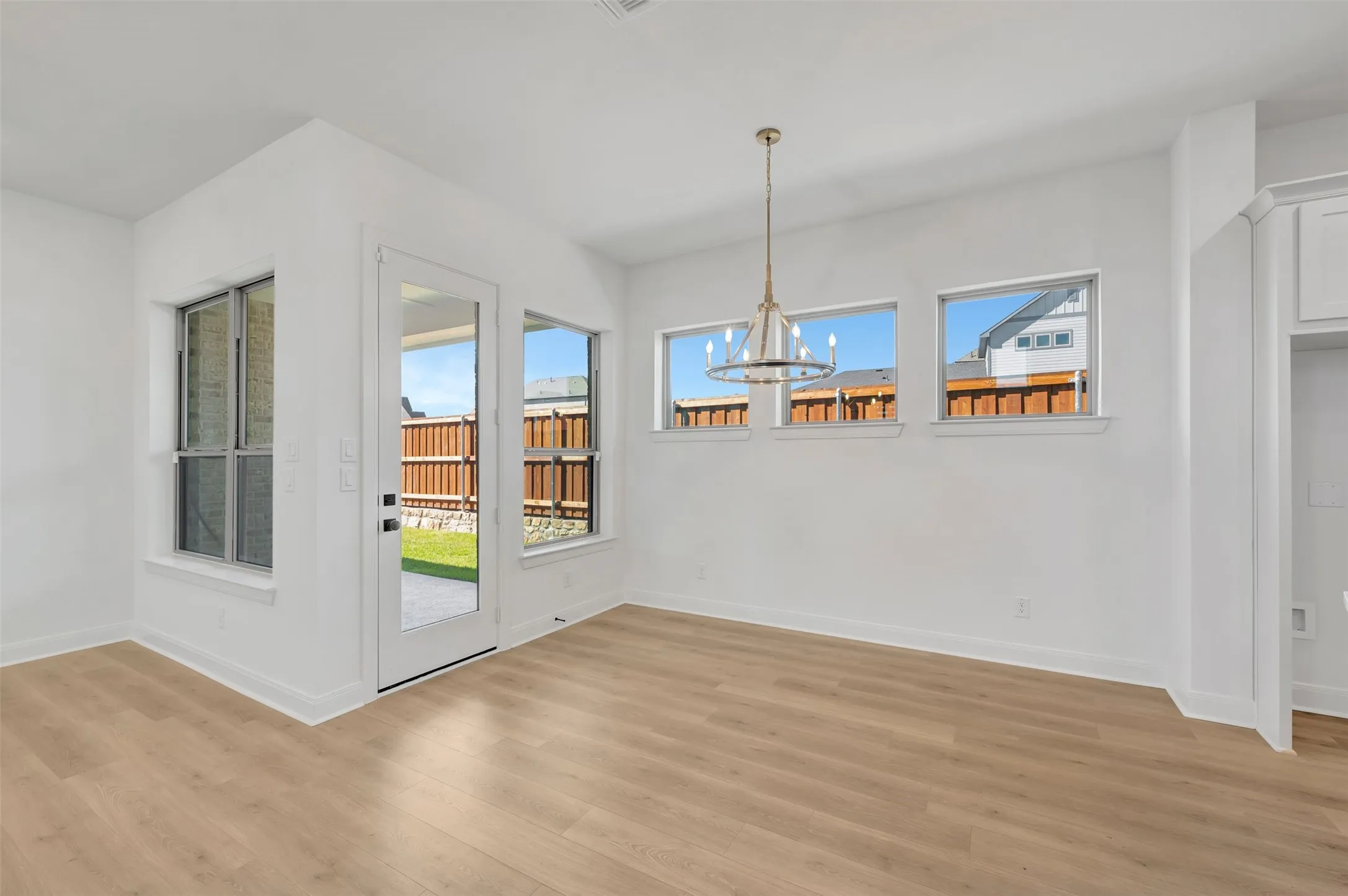 Wood-finish flooring with white walls