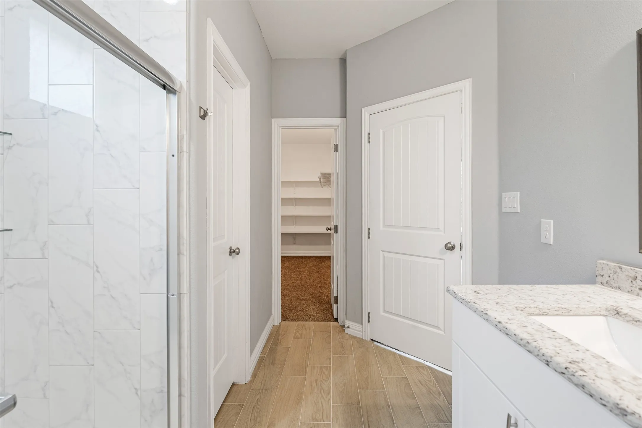 Primary bath with large walk in closet