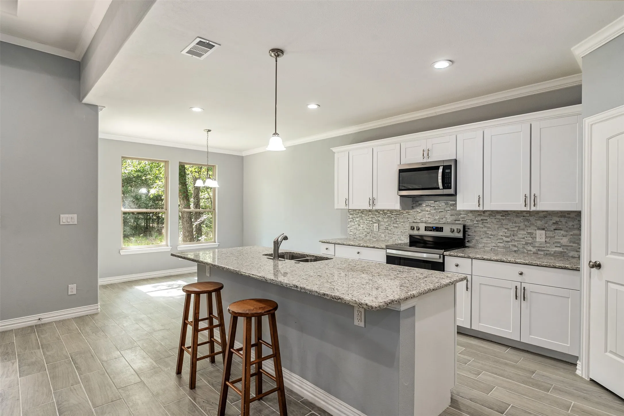 Kitchen with island and dining area