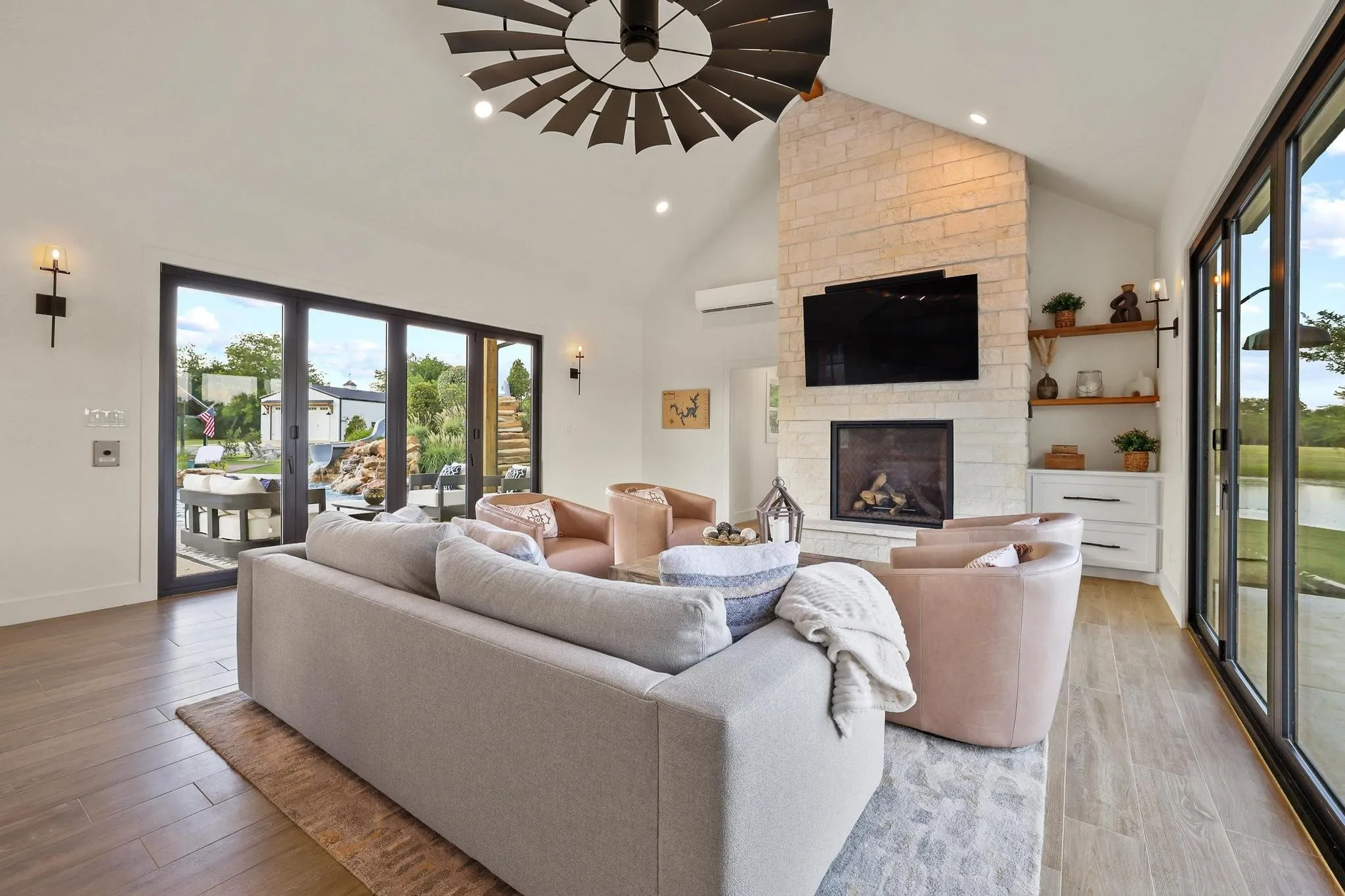 Pool house living area with entrance to private dock.