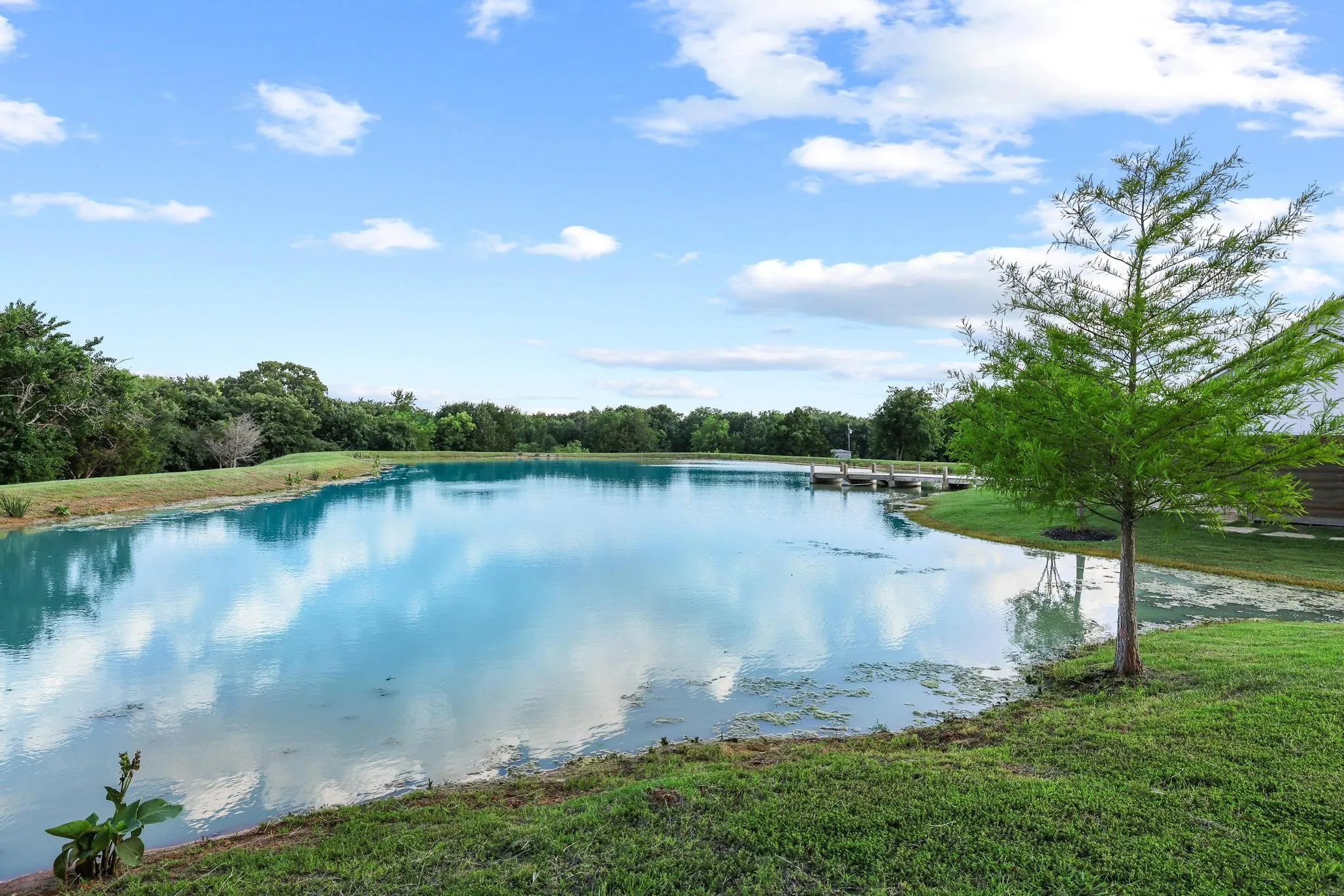 Stocked pond for fishing, kayaking, or sunset views