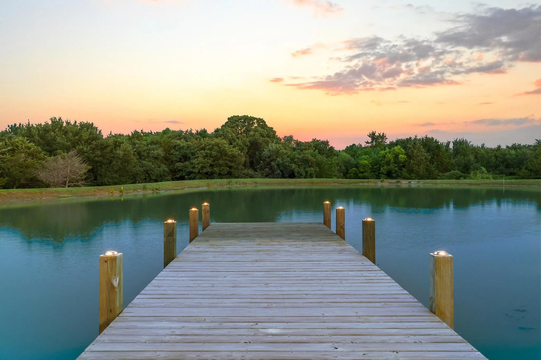 Private dock to stocked pond with sunset views