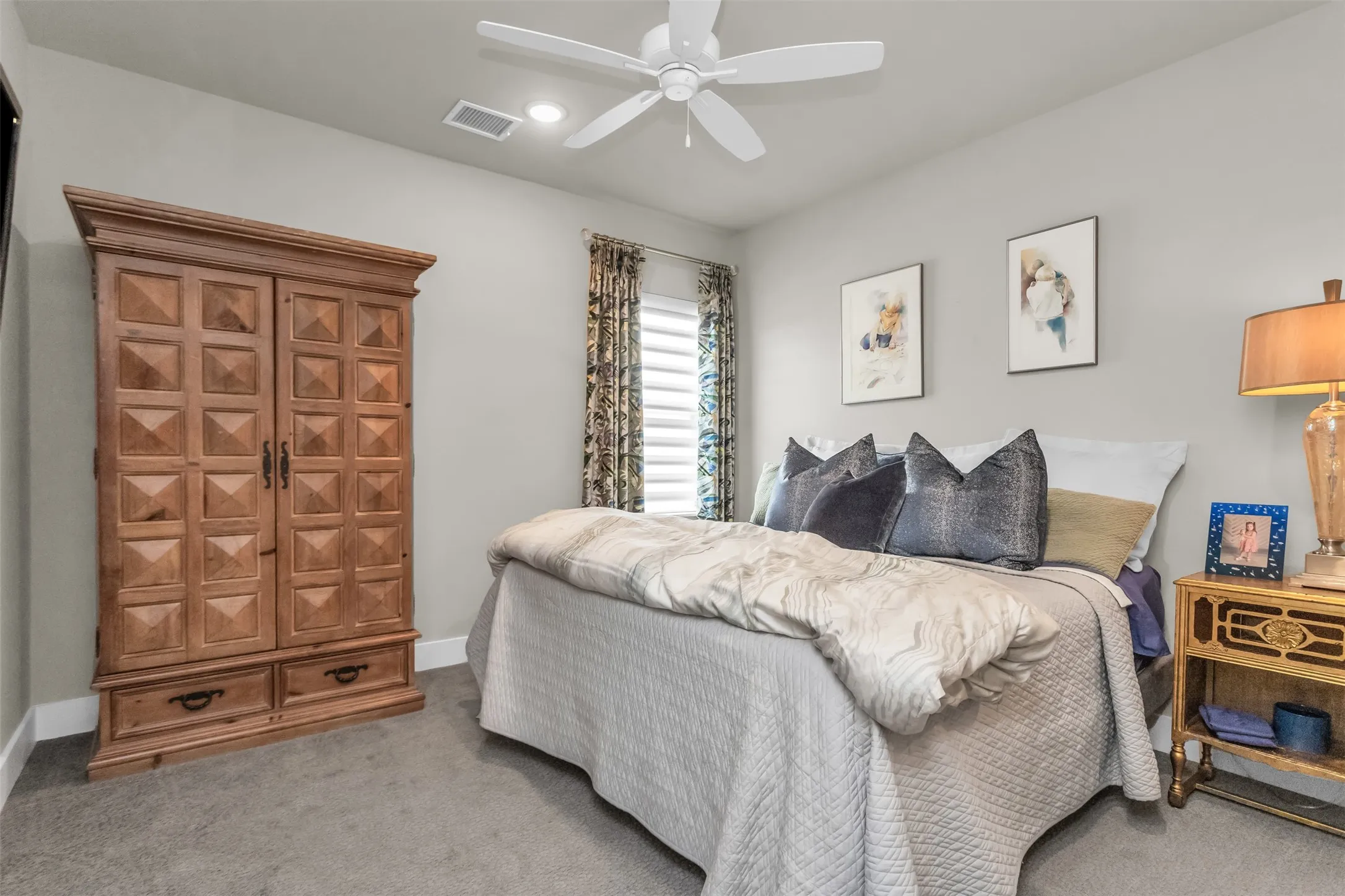 Soft gray carpeting complementing light gray walls