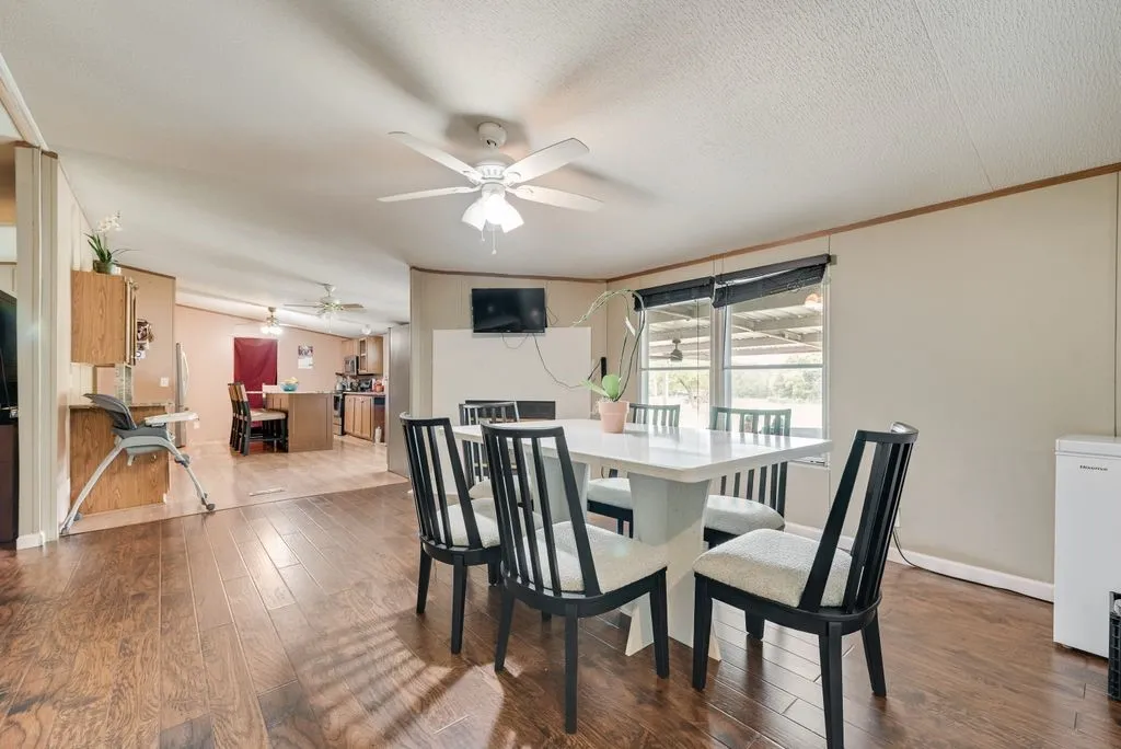 Dining room opens to the kitchen and living