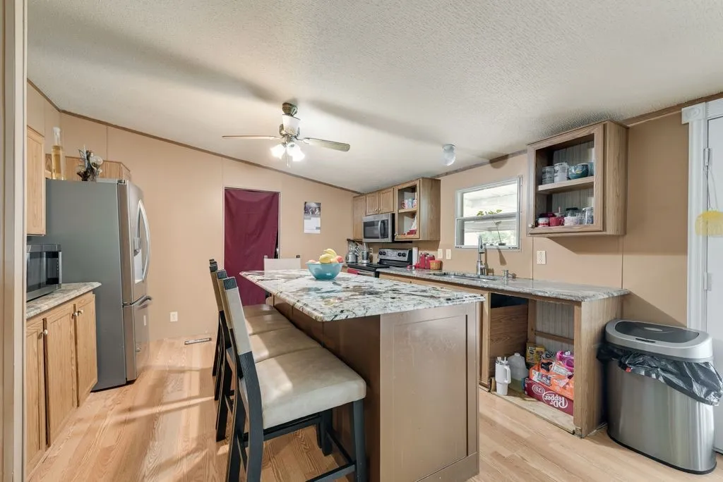 Large laundry room is off the kitchen
