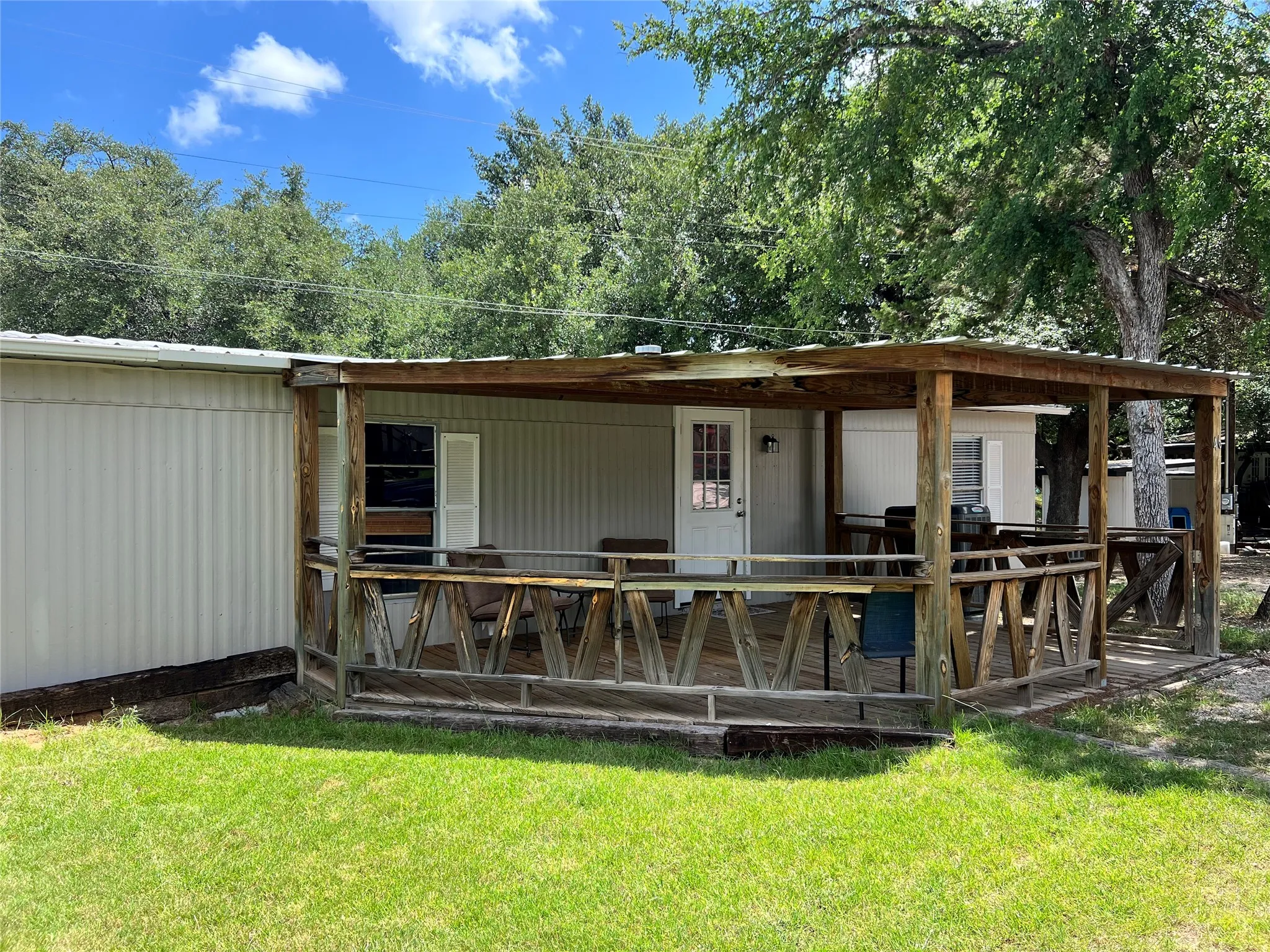 Manufactured Home For Sale in Palo Pinto County , 2334 Sanbar Road 46, Possum Kingdom Lake, Texas 76449, 3 Bedroom, 2 Bathroom, Garage spaces, 980 Sqft, built in 1983, mls#21295637, Real Estate Agent in Possum Kingdom Lake, Homes For Sale in Palo Pinto county, Homes For Sale in Possum Kingdom Lake, Realtor in Possum Kingdom Lake Texas, Real Estate Brokerage Independent Realty Texas, Luminita Cordes Realtor