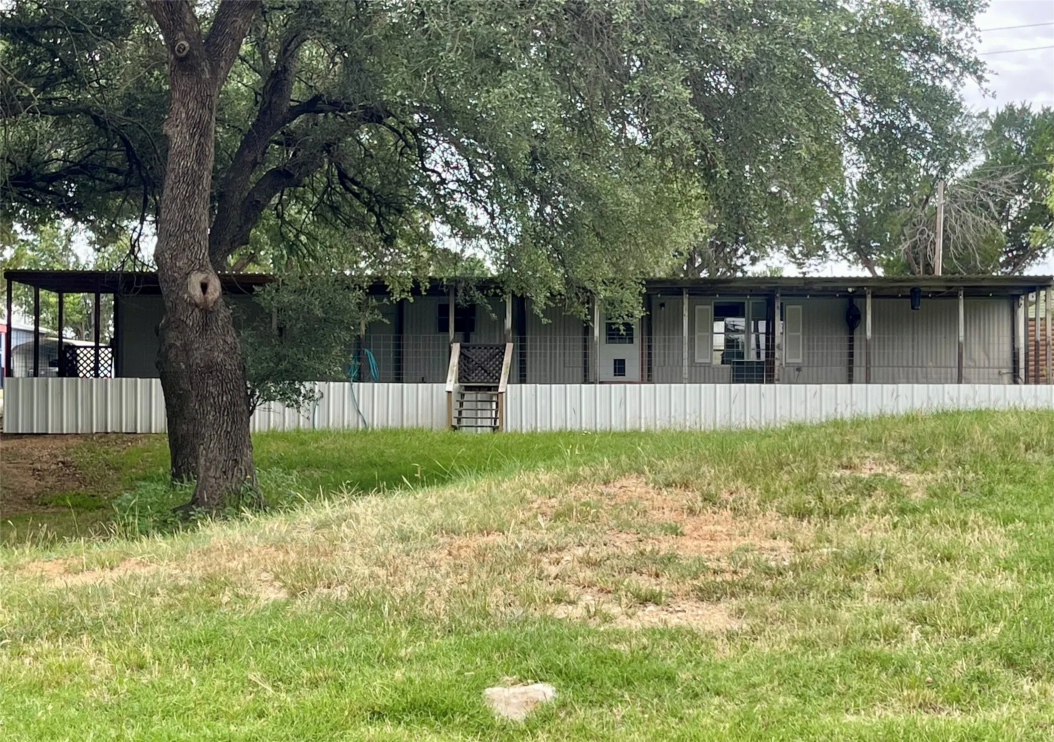 Manufactured Home For Sale in Palo Pinto County , 2334 Sanbar Road 46, Possum Kingdom Lake, Texas 76449, 3 Bedroom, 2 Bathroom, Garage spaces, 980 Sqft, built in 1983, mls#21295637, Real Estate Agent in Possum Kingdom Lake, Homes For Sale in Palo Pinto county, Homes For Sale in Possum Kingdom Lake, Realtor in Possum Kingdom Lake Texas, Real Estate Brokerage Independent Realty Texas, Luminita Cordes Realtor