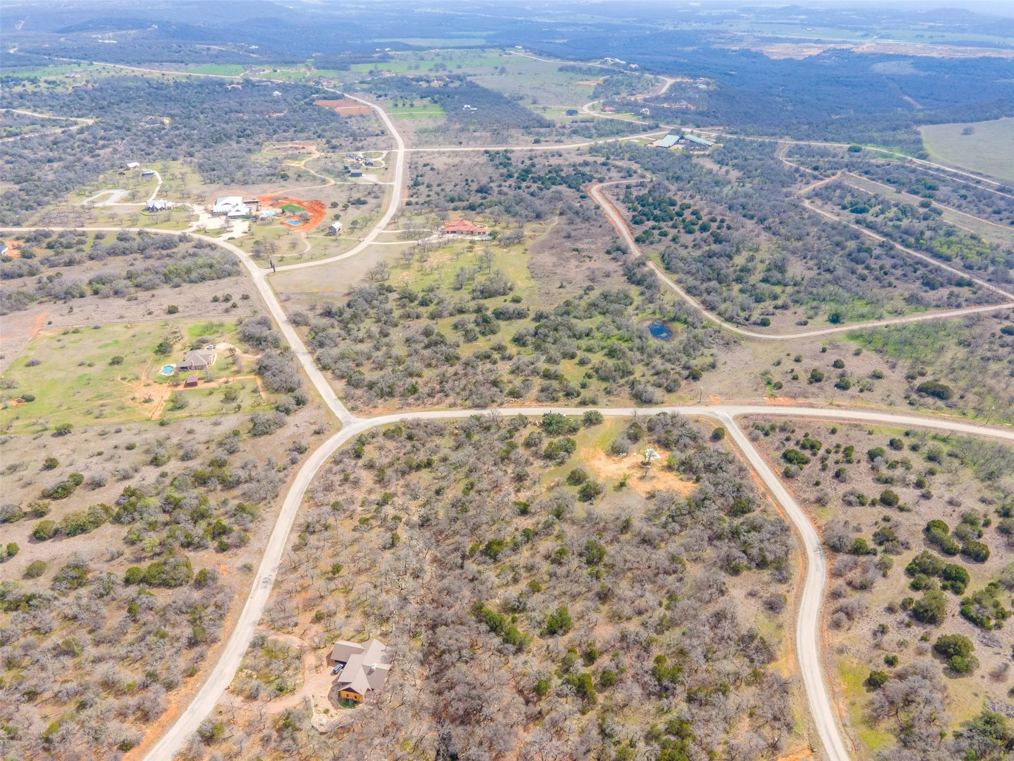 Aerial image showing buildable Hill Country lot with privacy, flexible terrain, and natural features in Gordon TX