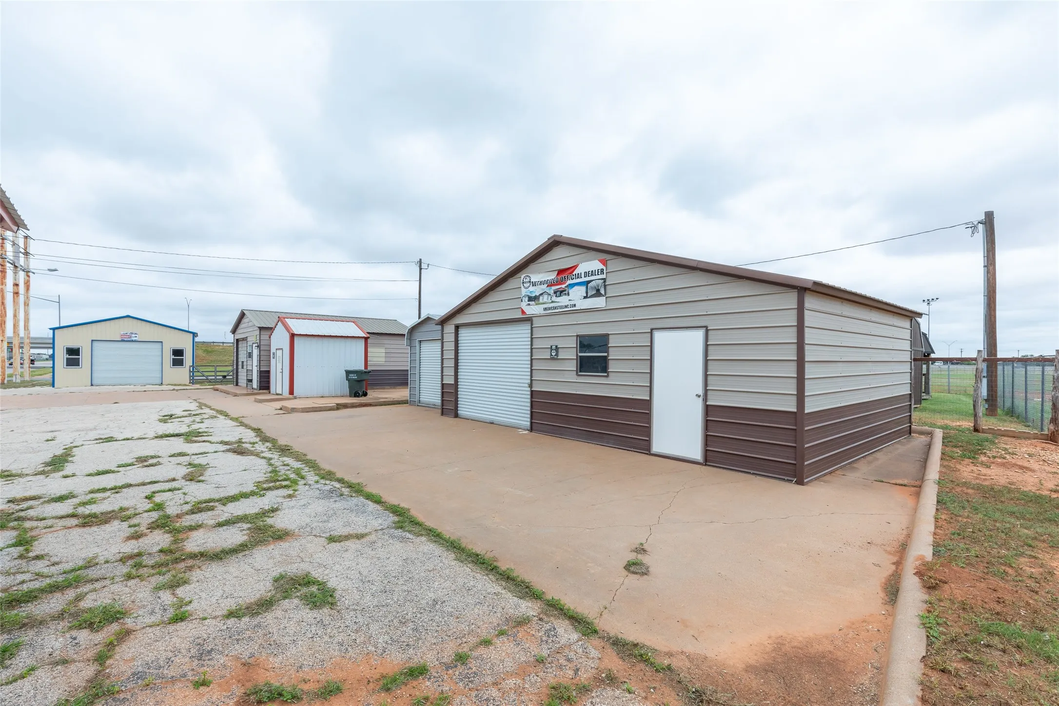 Small grey building to the left of main building is not included in this purchase.