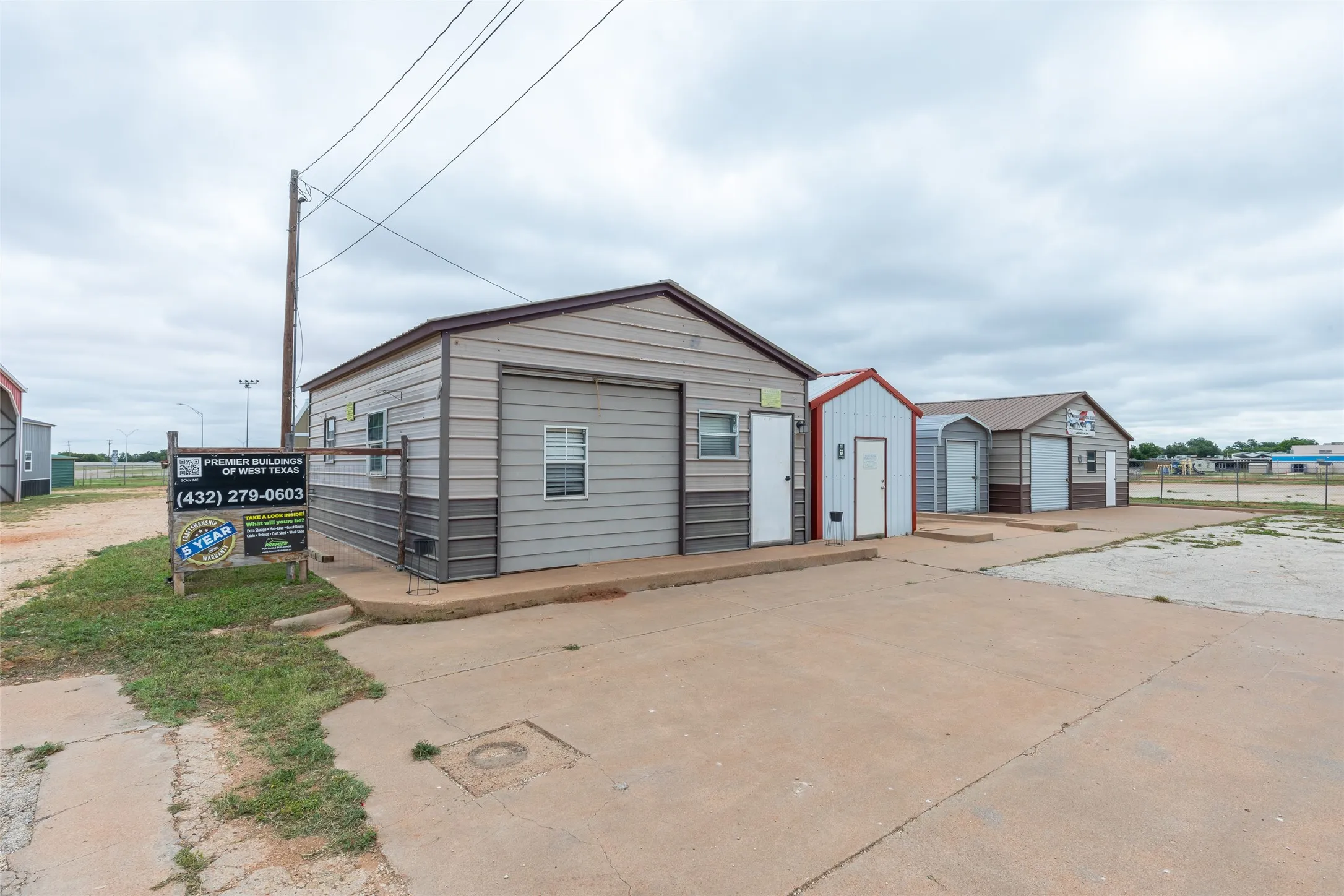 3rd small grey building from the left is not included in this purchase.