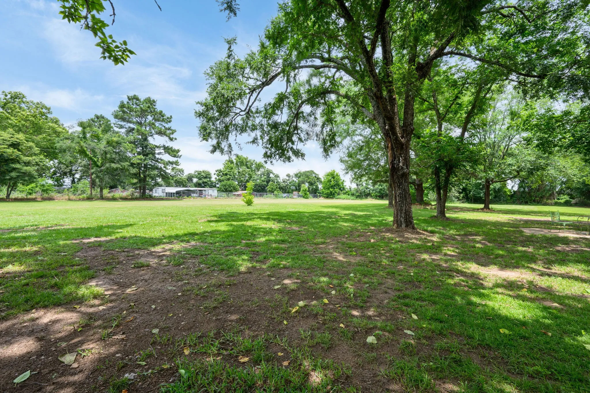 Expansive green lawn providing abundant open space