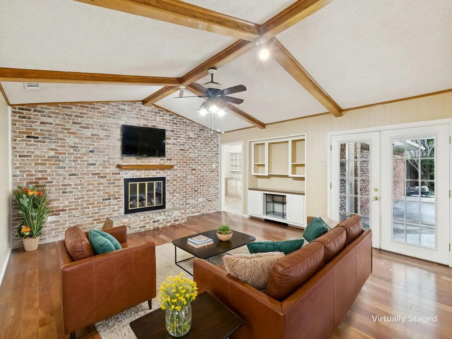 Center of the home with beautiful original brick bas fireplace