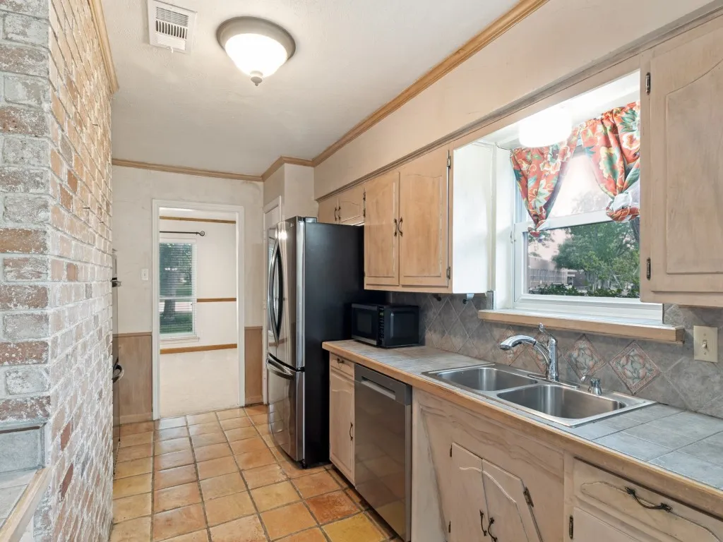 Newer stainless steel frig and dishwasher