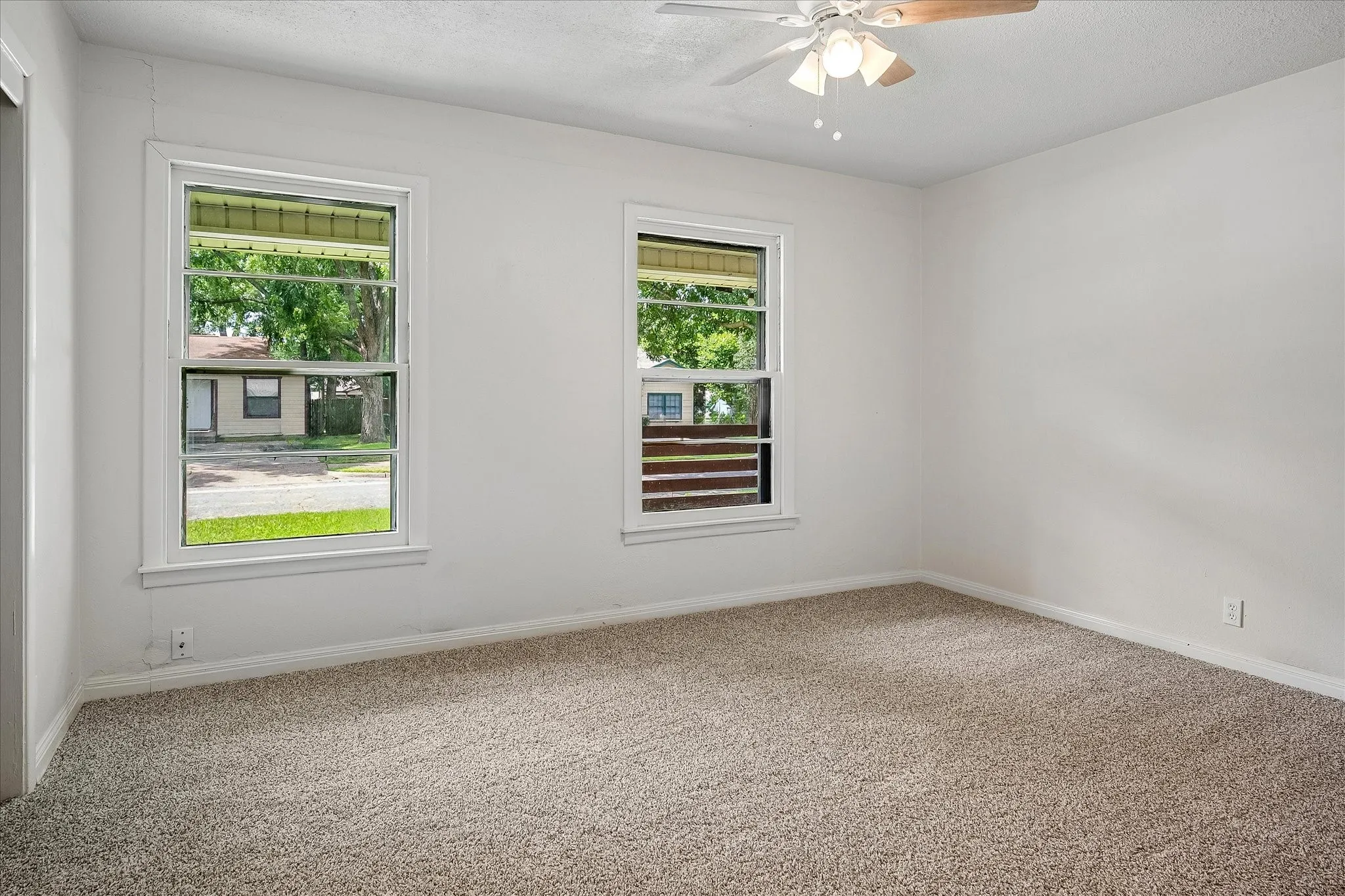Secondary bedroom 2 with fresh carpet installed in May of 2026
