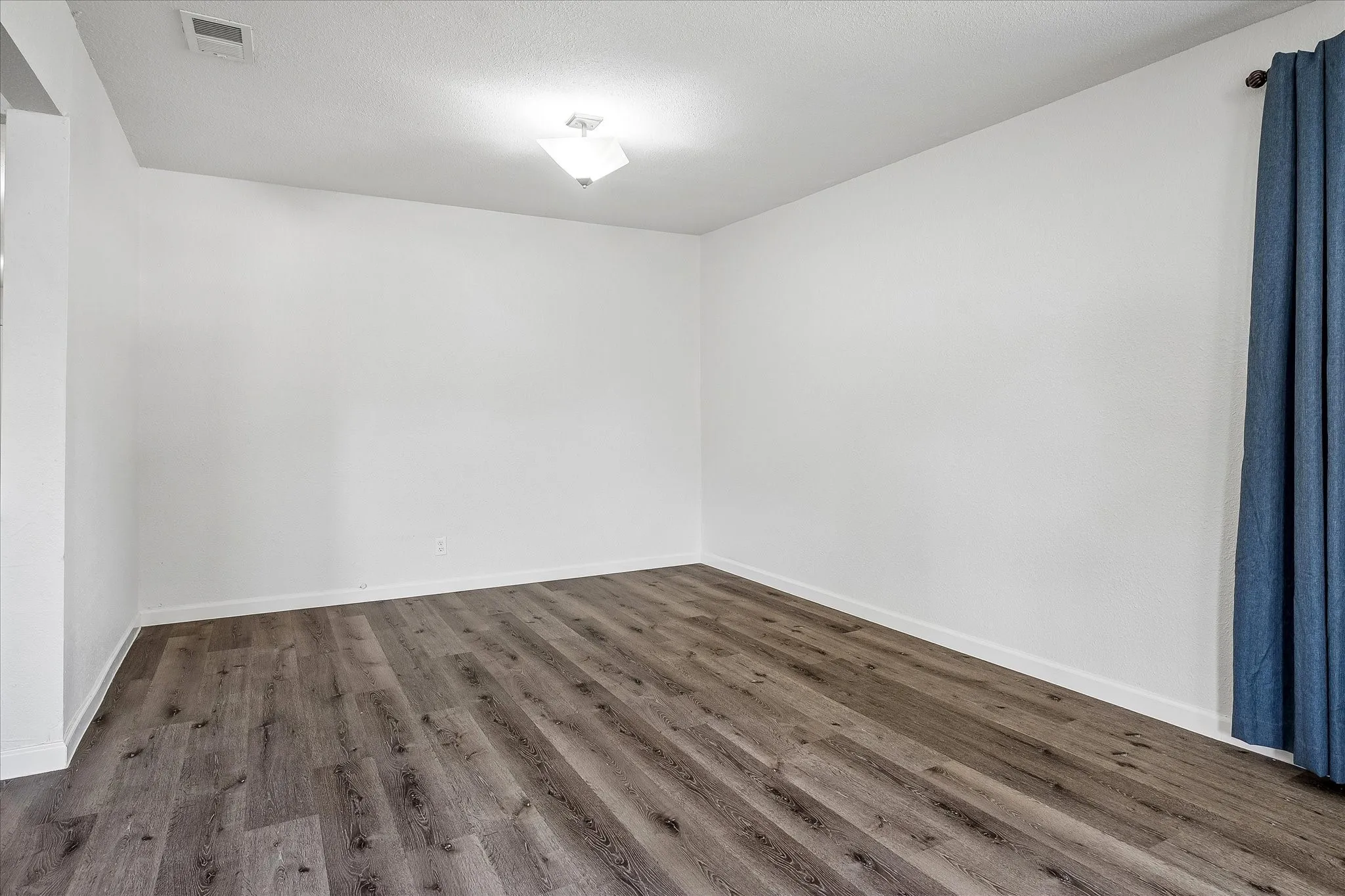 Living room with great wall space for art or a large TV.