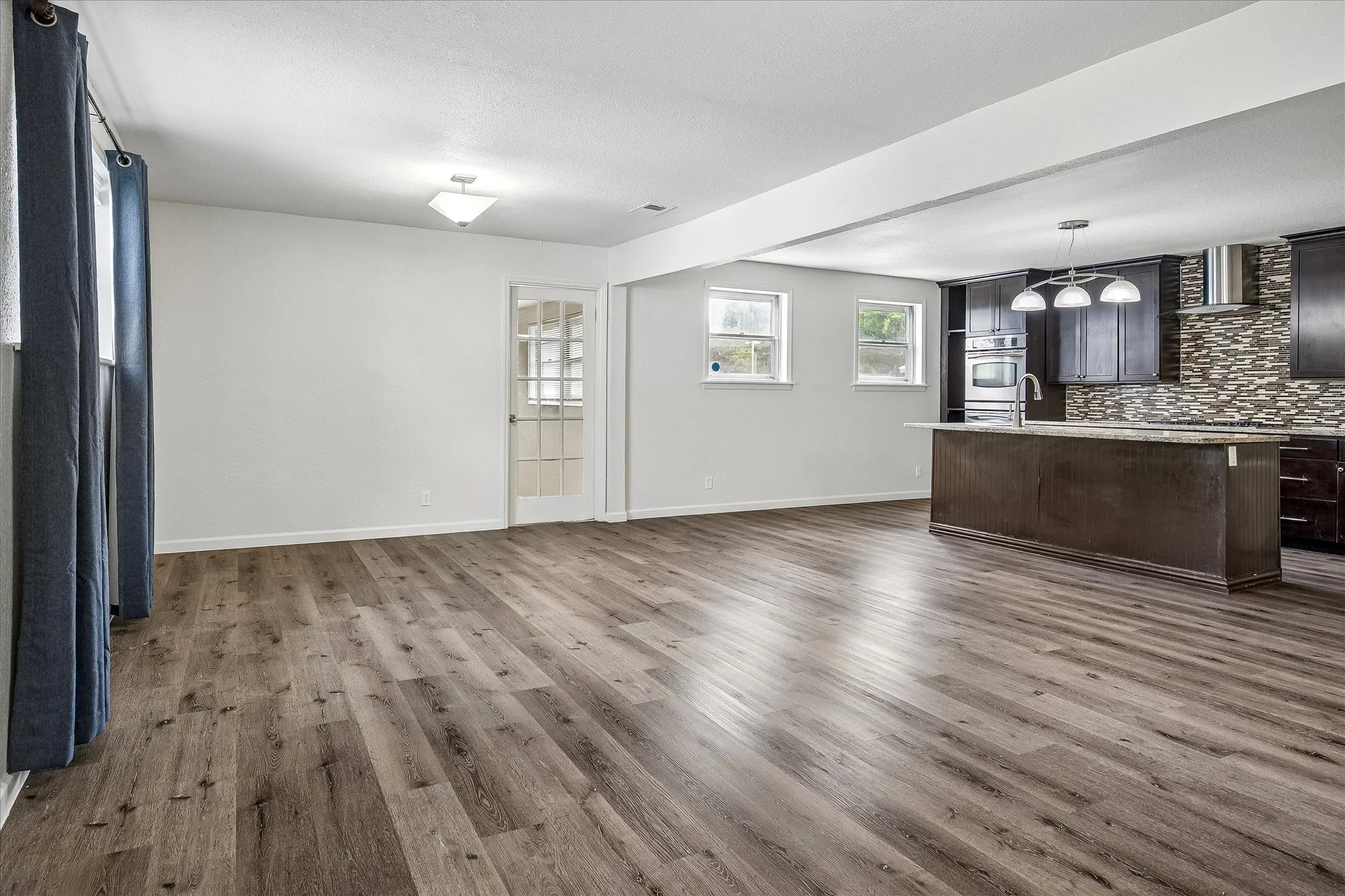 Open concept Living, dining, and kitchen space.